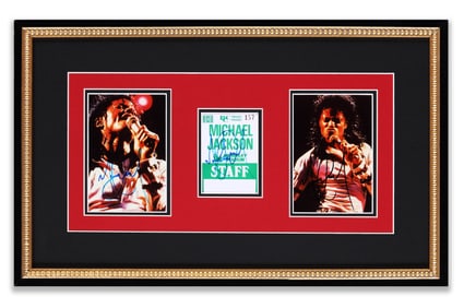 A PHOTO SIGNED BY MICHAEL JACKSON AND A TICKET