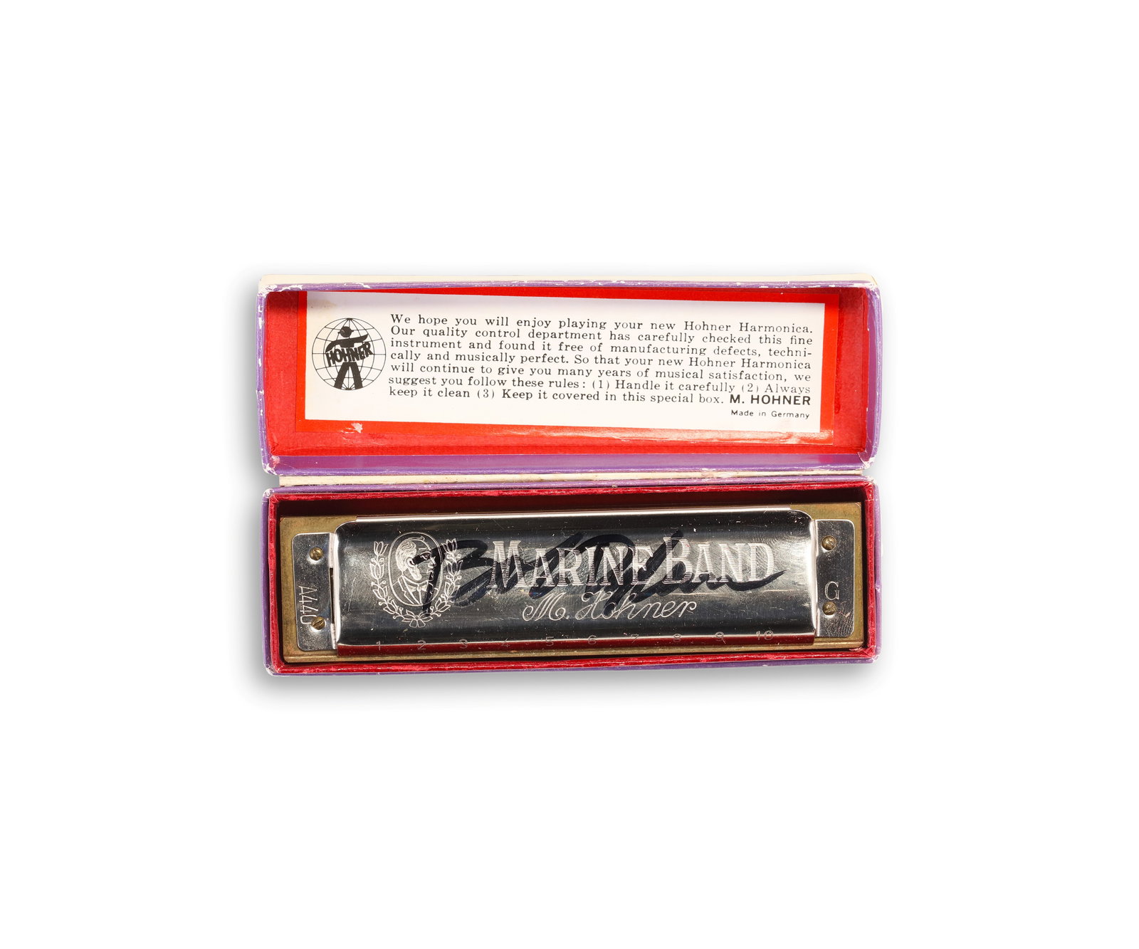 BOB DYLAN SIGNED MARINE BAND HARMONICA: BOB DYLAN SIGNED MARINE BAND HARMONICA Dimensions: 4 x 3/8 inches (10 x 2cm) Provenance and Authenticity: This item includes a certificate of authenticity. A defensible attribution is best supported b