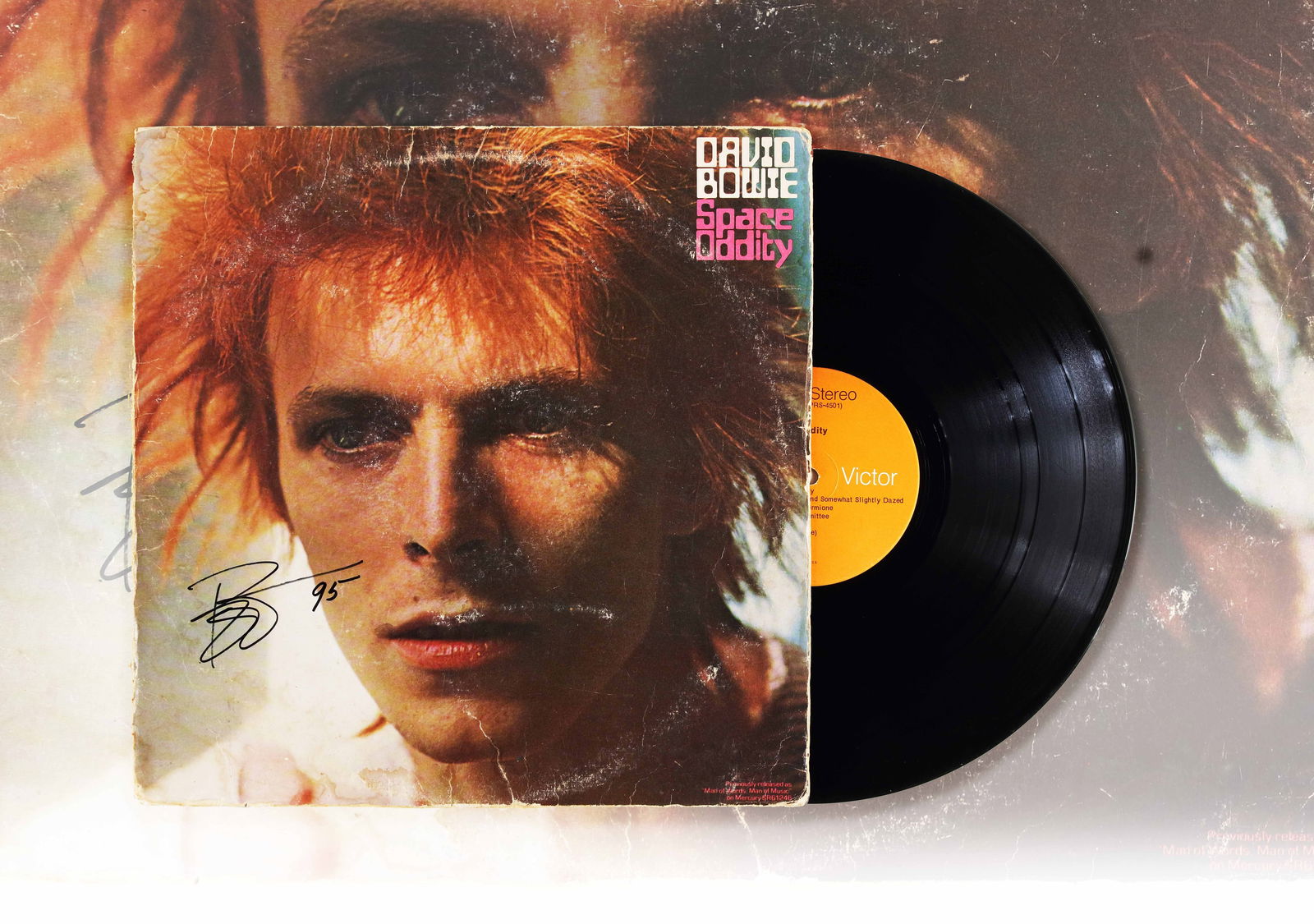 DAVID BOWIE (1947-2016) - SIGNED AND DATED "SPACE ODDITY" ALBUM (1995): DAVID BOWIE (1947-2016) - SIGNED AND DATED "SPACE ODDITY" ALBUM (1995) Dimensions: Vinyl records Size 12 1/4 x 12 1/6 in Provenance and Authenticity: This item includes a certificate of authenticity.