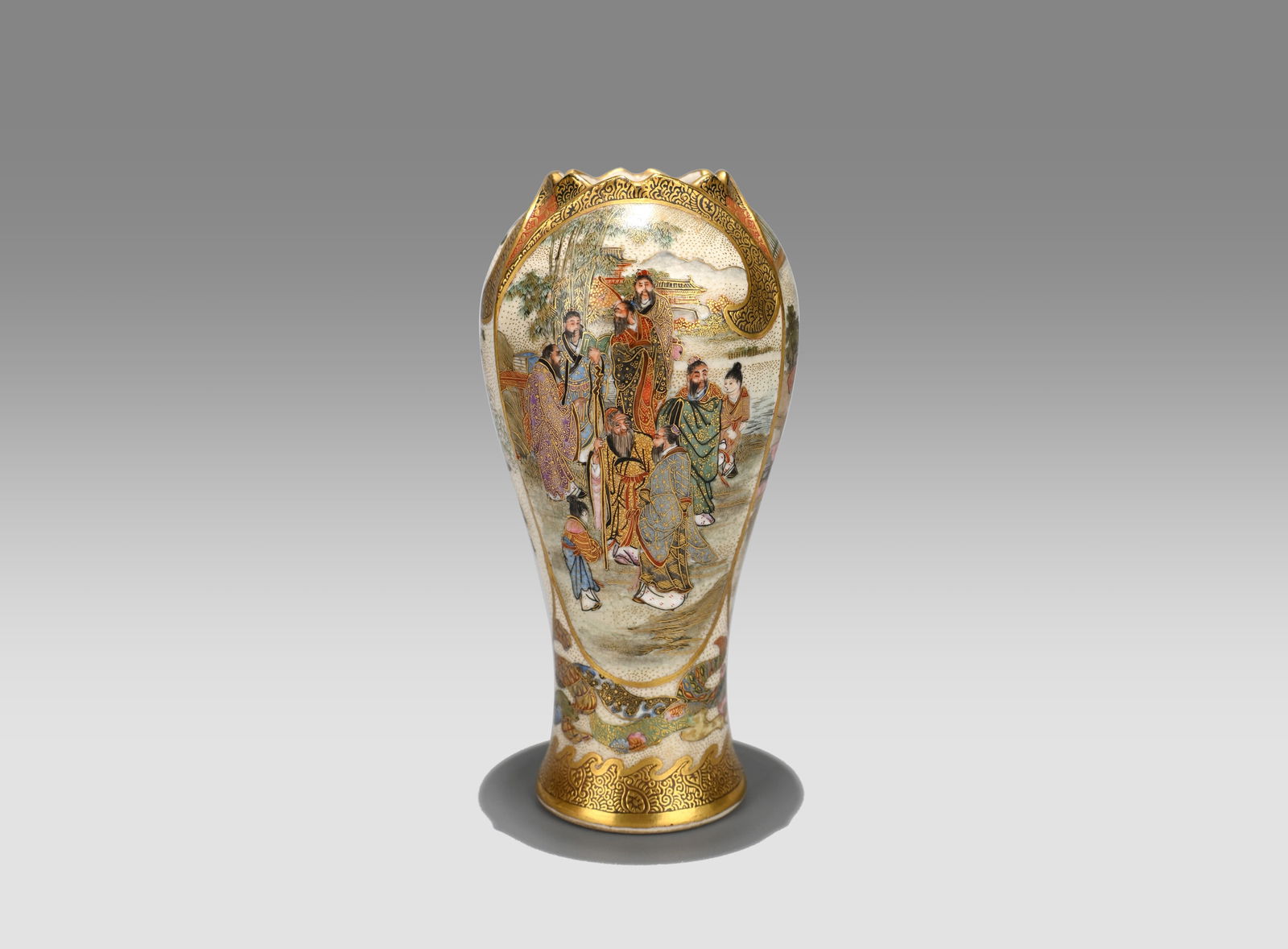Satsuma Vase by Hiramatsu Genzan: This vase features an elegantly elongated silhouette, rising with refined poise, while the flaring mouth exhibits softly undulating, petal-like contours that lend the piece a graceful decorative rhyth