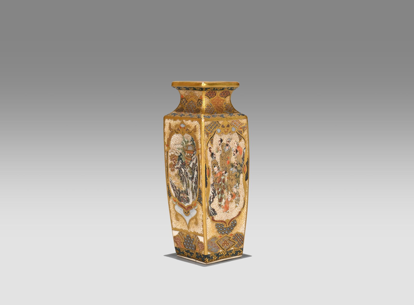 Satsuma Vase by Meiza: This Satsuma vase, crafted by the Meizan workshop, is a refined example of the atelier’s celebrated mastery of ultra-fine polychrome and gilt decoration. The slender, angular body is fully adorned i