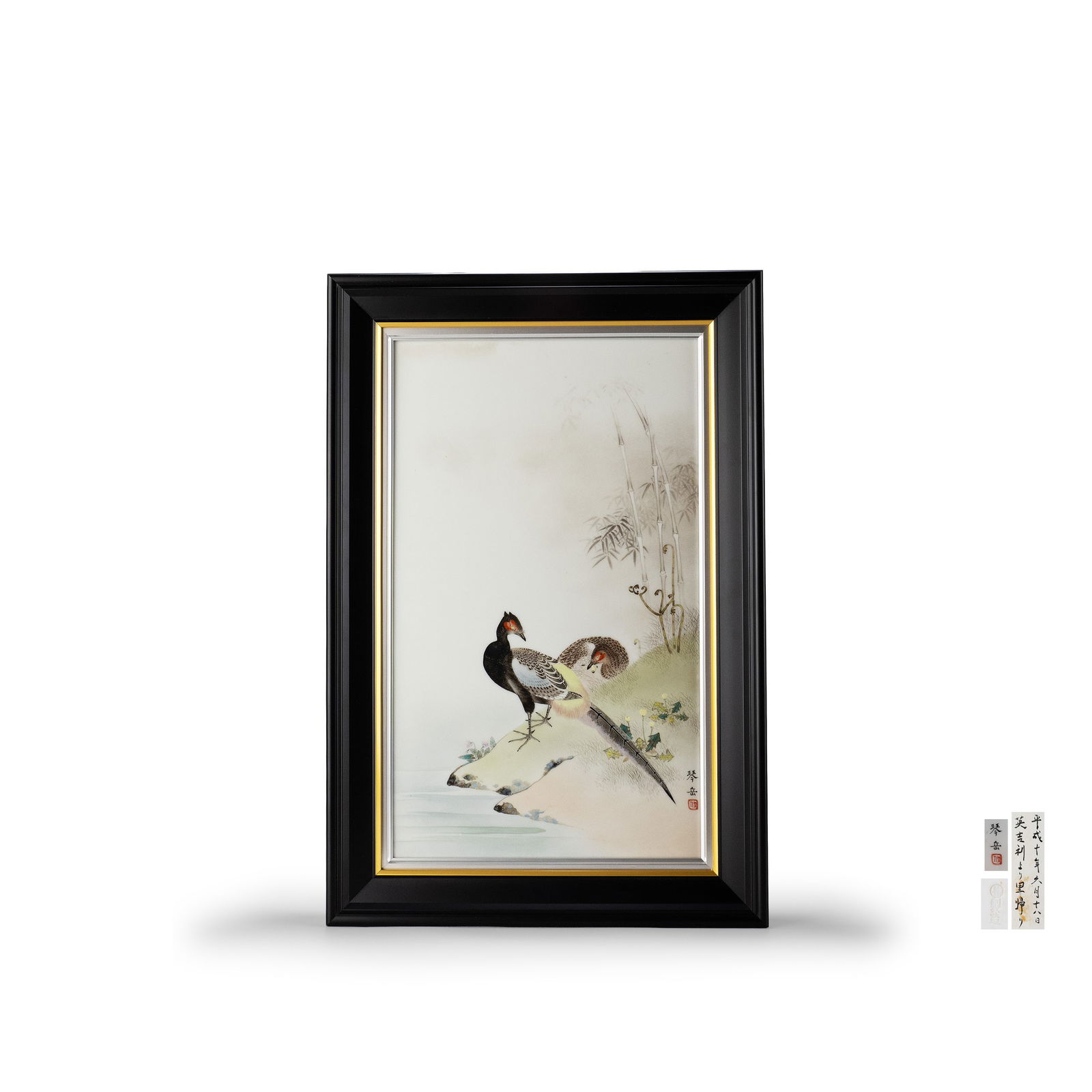 Framed Ceramic Plaque by Kato Zenji III: Ceramic plaque by Kato Zenji III, painted by Mori Kengaku. The composition depicts a pair of pheasants beneath bamboo beside a quiet stream, executed in refined brushwork on a white glazed ceramic pan