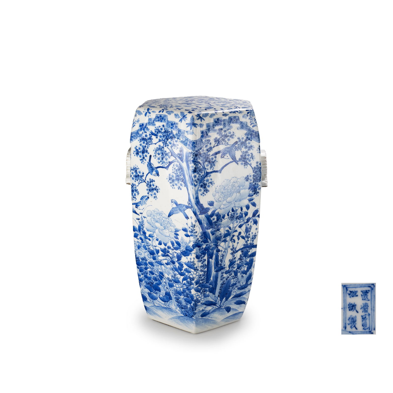 Seto Ware Chair by Kato Monemon: A finely executed hexagonal porcelain garden seat in underglaze blue, produced in Seto and bearing the seal of Kato Monemon. The faceted body is richly decorated with dense floral and botanical motifs