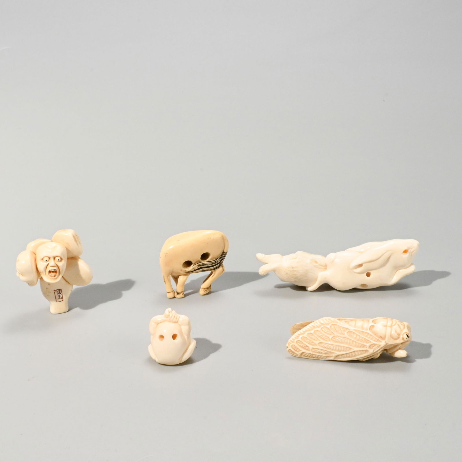 Five netsuke, signed - 4