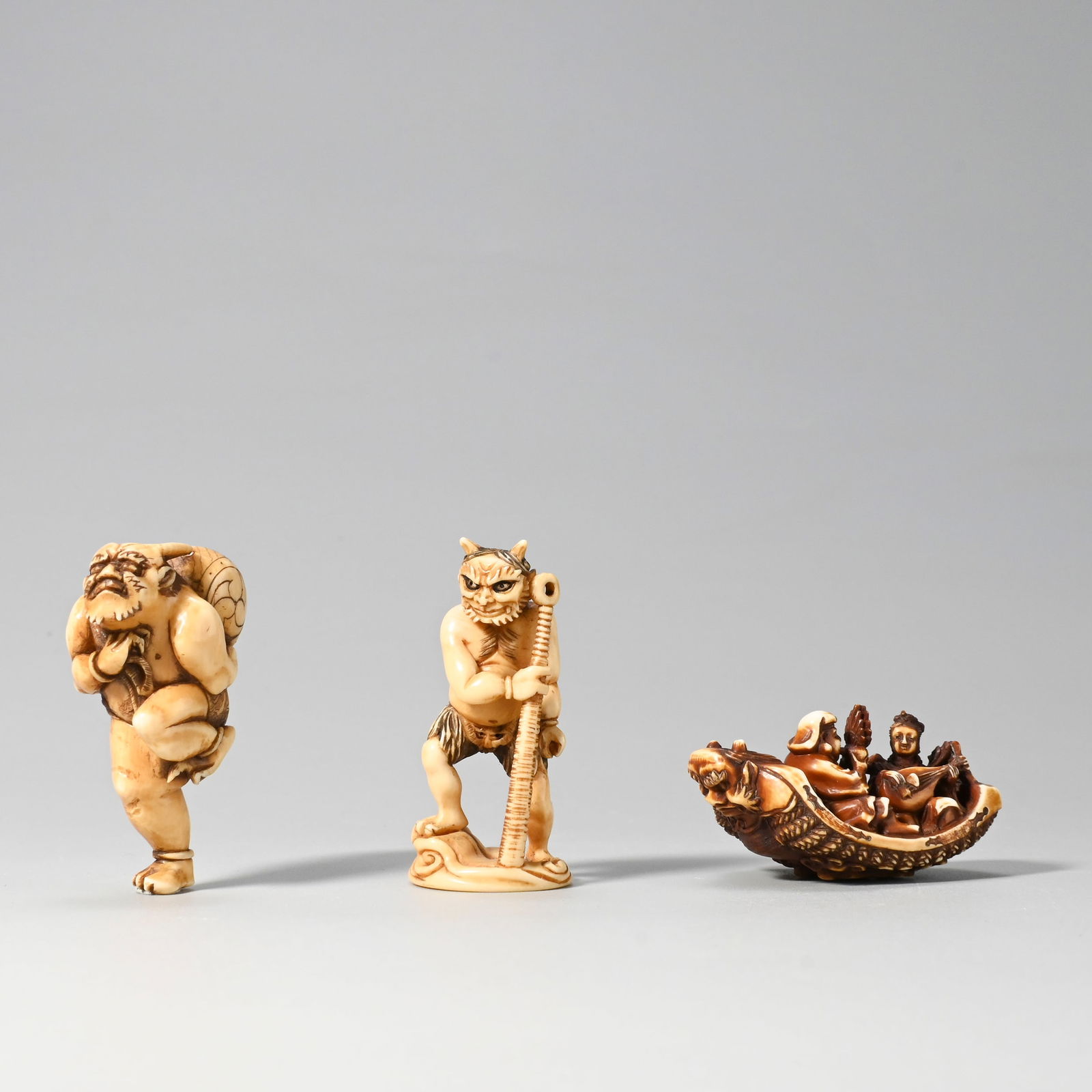 Three netsuke, signed - 2