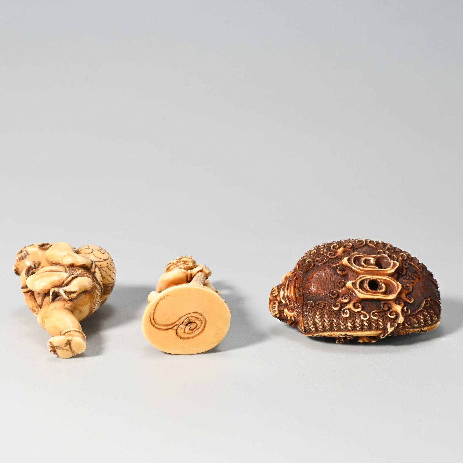 Three netsuke, signed - 7