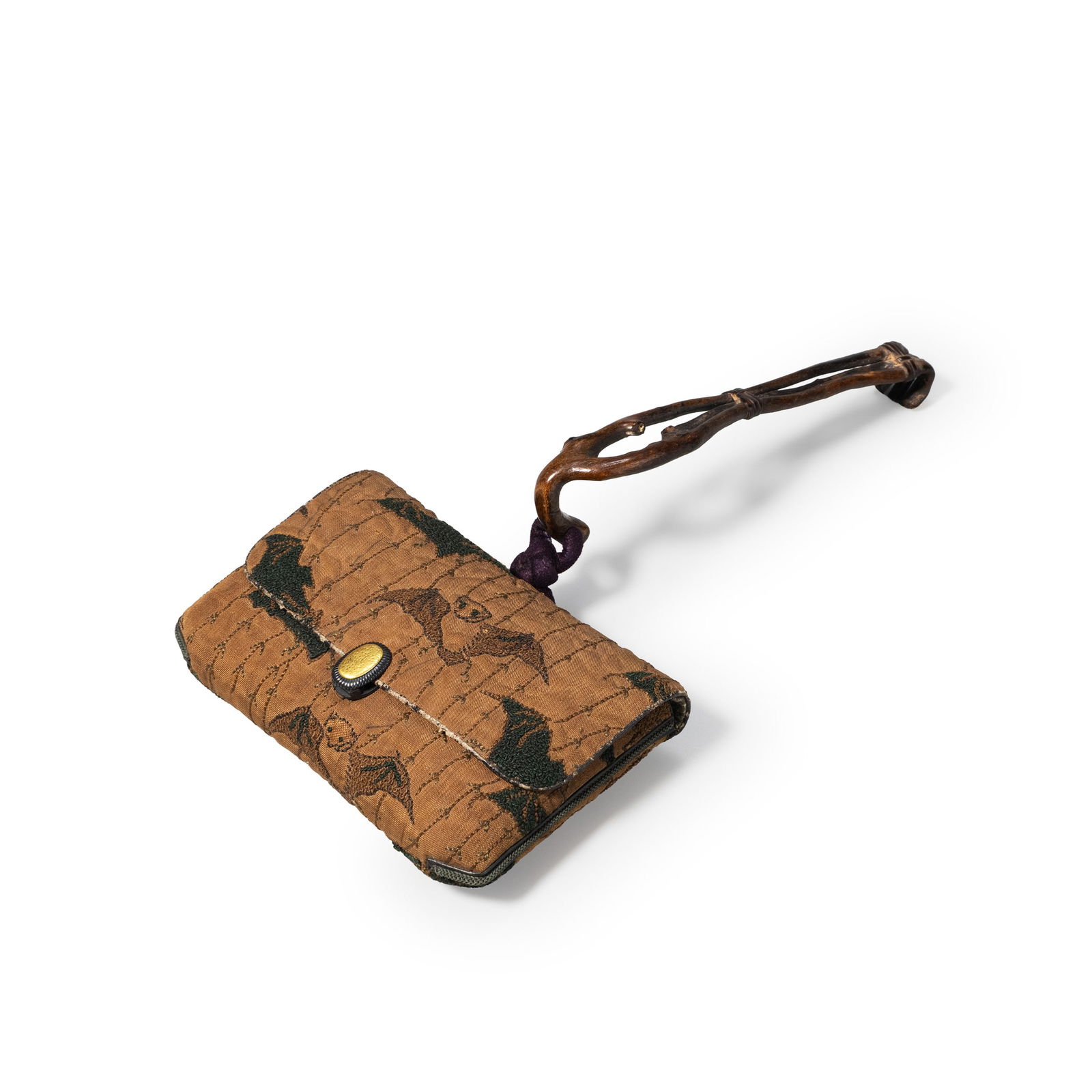 Tobacco pouch with gold-inlaid metal fittings: This is a tobacco pouch fitted with gold-inlaid metal mounts. The pouch is made from patterned textile, featuring animal motifs woven into the fabric, showing a subdued palette and a patina consistent