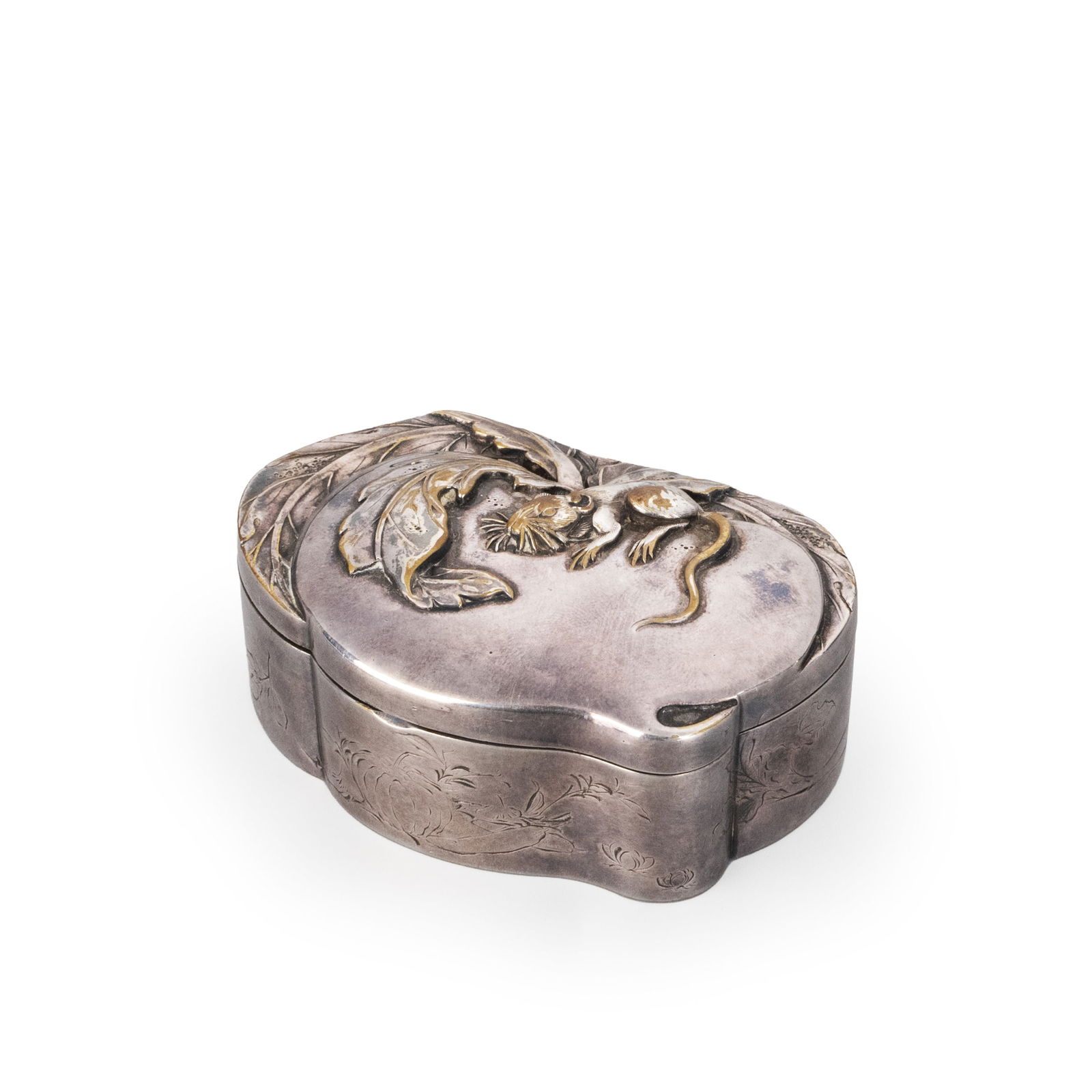 Silver Kogo: This silver incense container is formed by hammering, its compact body shaped in a natural and expressive silhouette that exemplifies the restrained aesthetic characteristic of Japanese metalwork. Thr