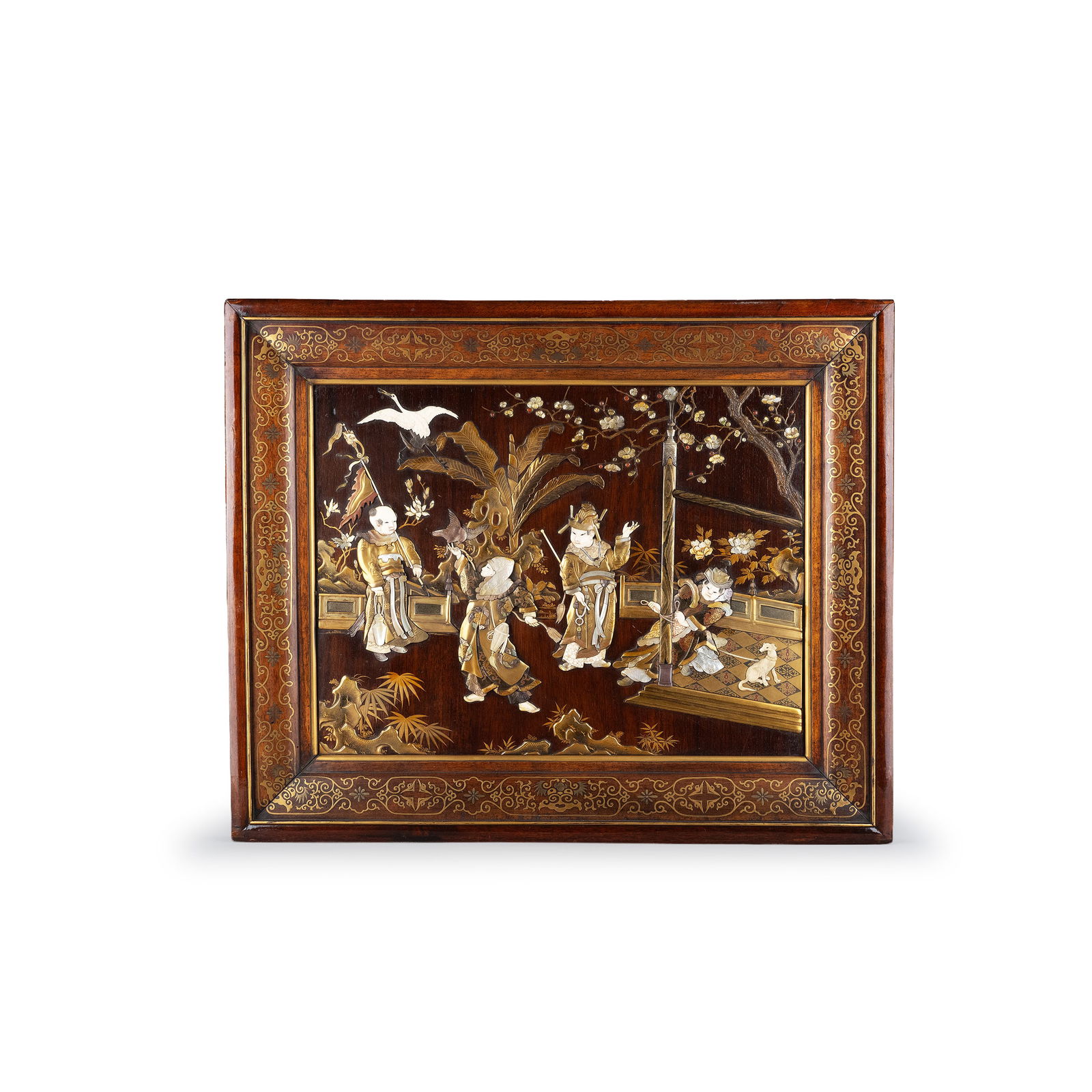Framed Artwork with Shibayama Inlay and Gold Makie: A fine Shibayama inlaid lacquer panel with gold maki-e decoration, depicting a lively figural scene set within a garden pavilion. The composition presents elegantly attired figures engaged in animated