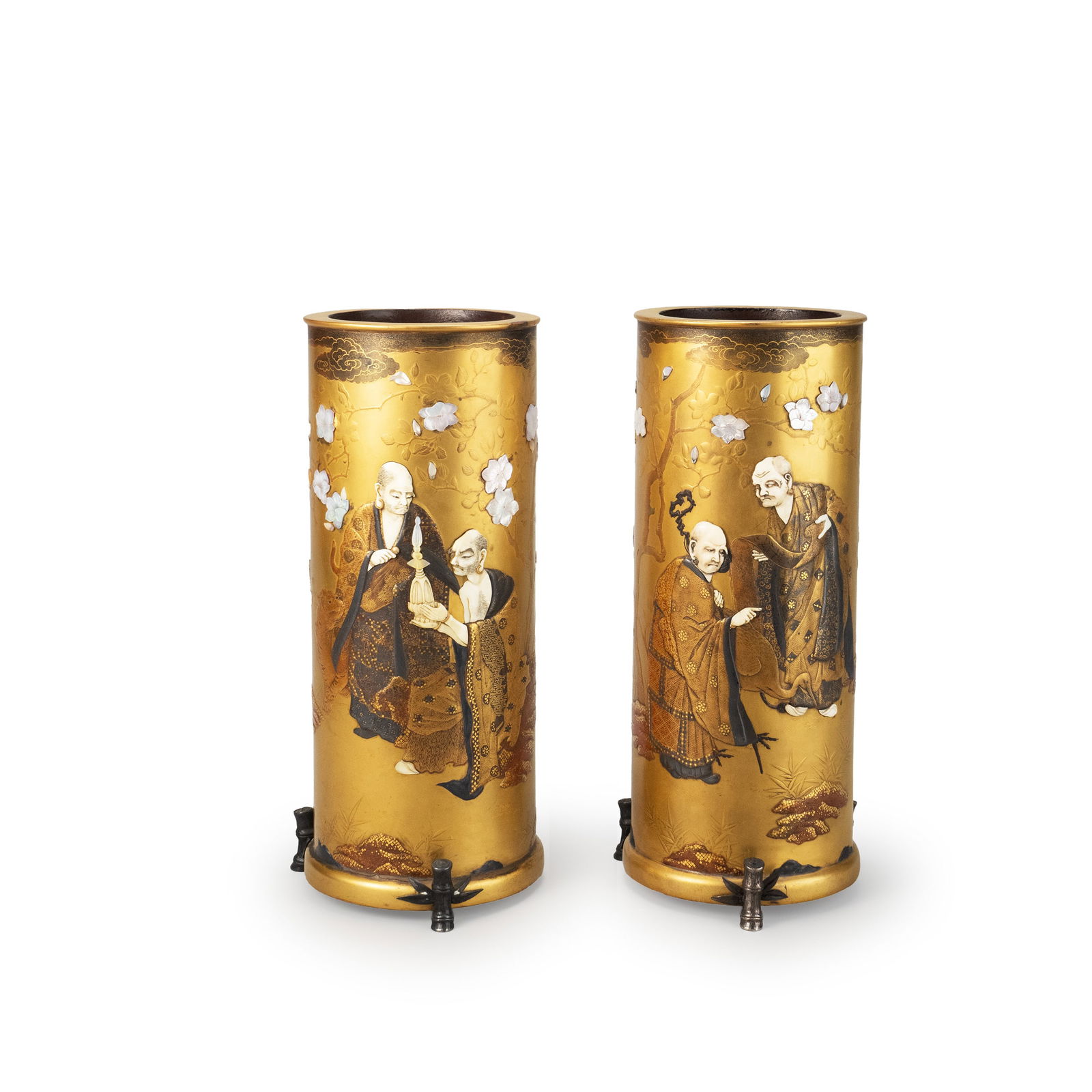 Pair of Shibayama inlay gilt maki?e vases: This work is a pair of cylindrical vases with a gold-based ground, crafted using the Shibayama inlay technique, depicting arhats and floral-and-bird motifs. The surface features intricate background p