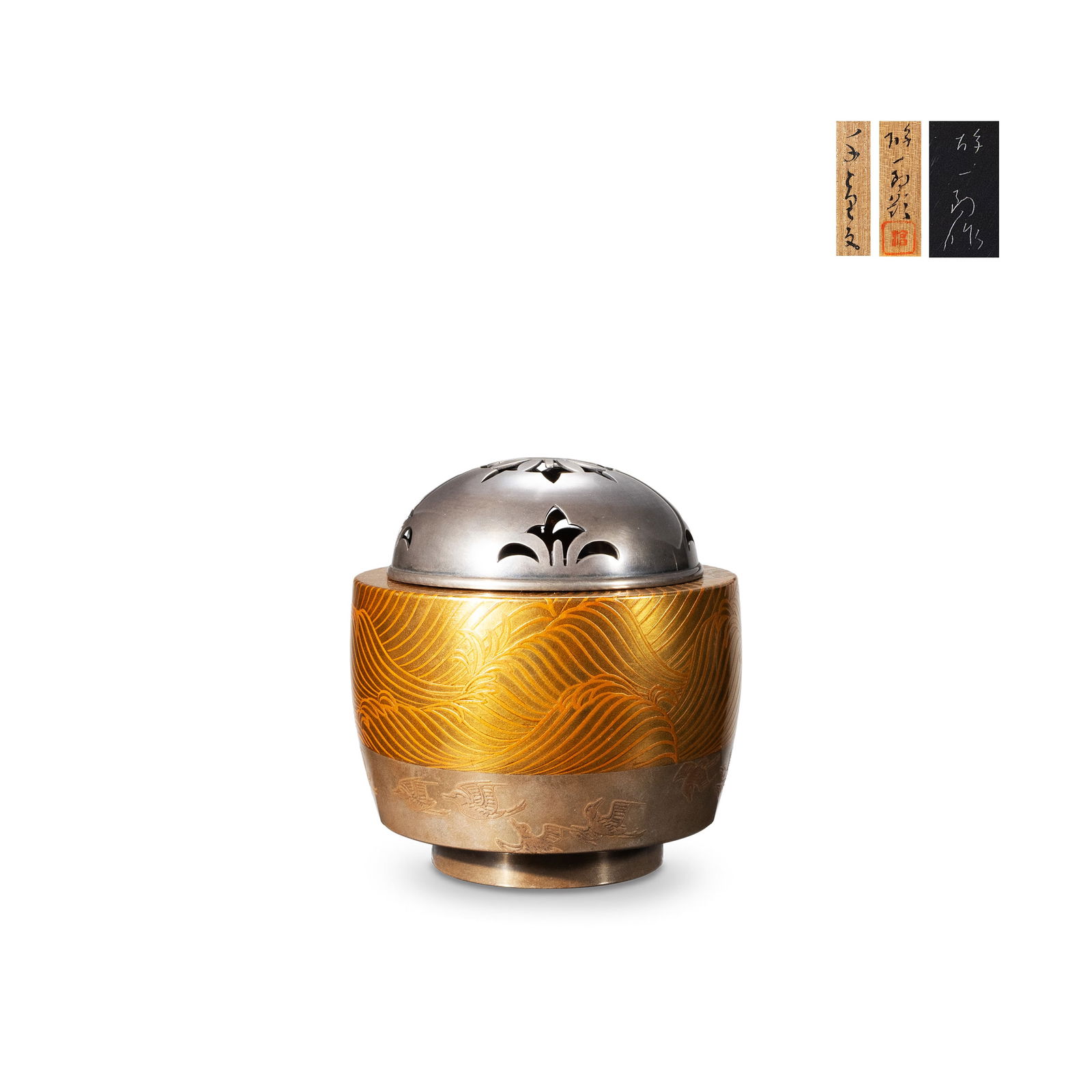 K?ro with Gold Makie, Signed, with Tomobako: A refined incense burner decorated in gold maki-e with stylized waves and chidori birds. The rounded body is elegantly proportioned, the upper section densely covered with flowing wave patterns execut