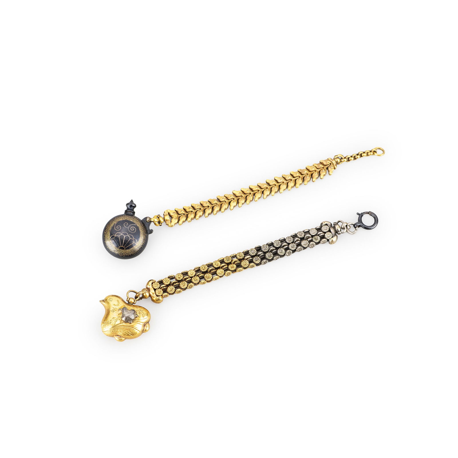 Two Bronze Flower Locks with Gold and Silver Inlay: A pair of decorative metal chains in copper alloy with gold and silver inlay. The first example composed of articulated gilt leaf form links terminating in a small circular case decorated with wave an