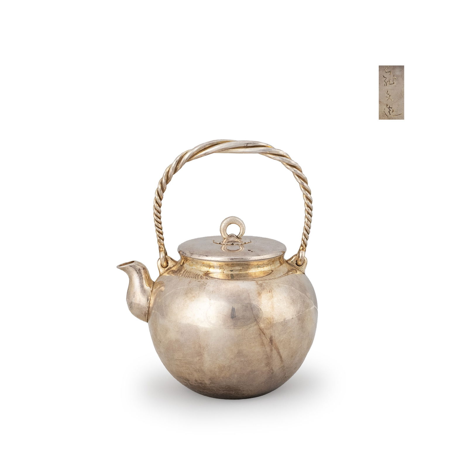 Pure Silver Kettle By Kibundo: Its rounded, full-bodied form is complemented by a neat short spout and a twisted handle with a subtle twist, presenting a simple yet refined appearance. The lid features a circular knob secured by a