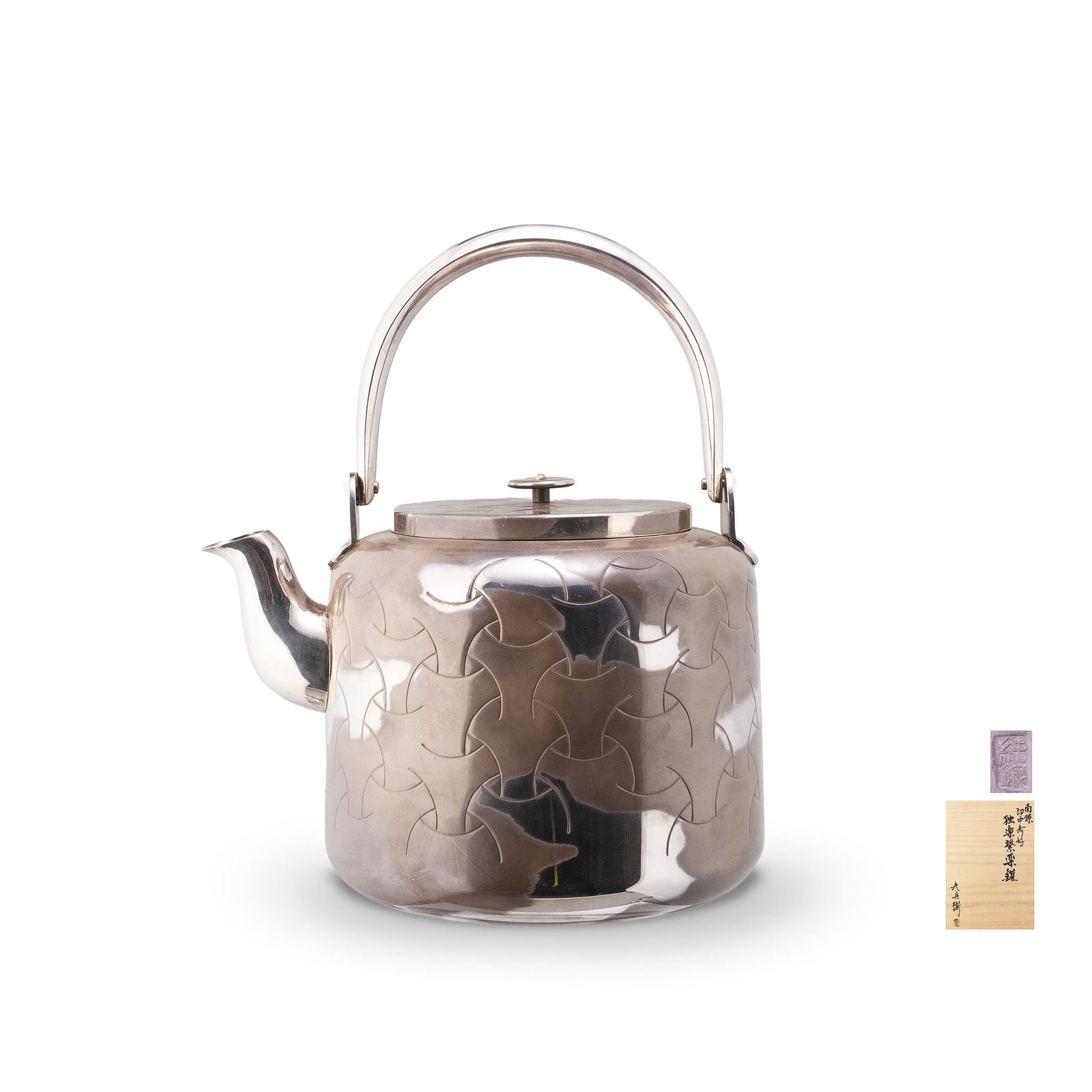 Tea Kettle by Hikobei, with Tomobako: A silver [nanry?] kettle by Hikobei, executed in accordance with the aesthetic preferences of Sokuch?sai [13th head of the Omotesenke school of tea]. The vessel is of cylindrical form with a