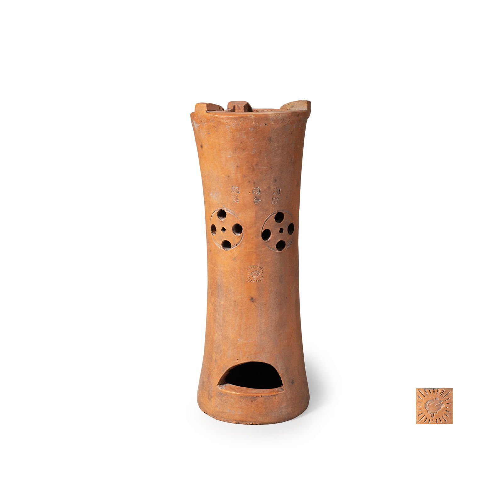 Yixing Zisha Clay Stove: A tall, waisted cylindrical red clay brazier with gently flared rim and base, raised on an integral circular foot. The body is pierced with two circular ventilating panels composed of evenly spaced ro