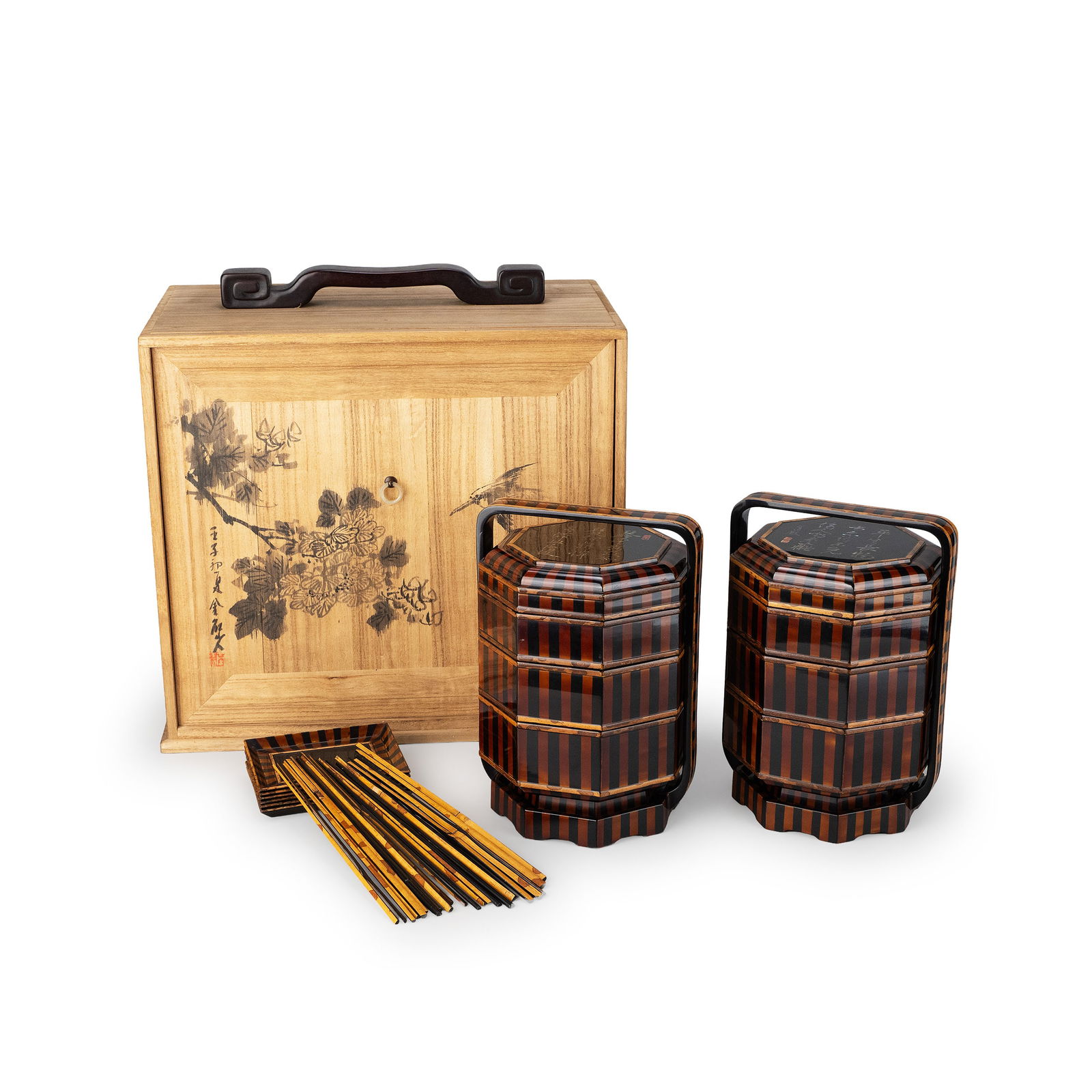 Two Three-Tier Lacquer Jubako, signed: A pair of three tiered lacquer jubako crafted with Xiangfei bamboo veneer, inlaid with mother of pearl and decorative inlay techniques. The exterior displays the distinctive vertical grain of the bamb