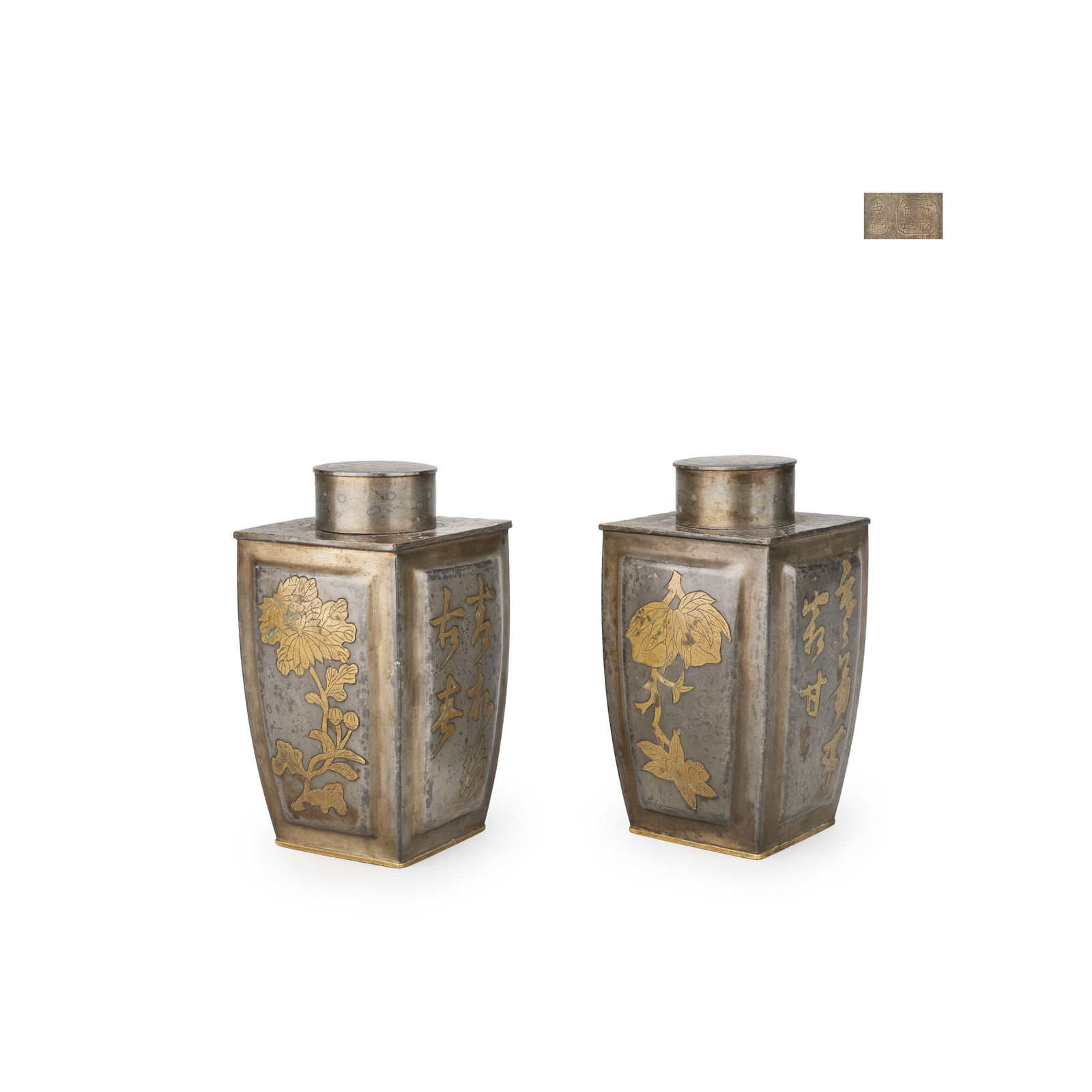 Pair of Pewter Tea Caddies by Kanemoto, Box: A matched pair of square-form tin tea caddies by Kenmo, each of tapering rectangular profile with short cylindrical neck. The surfaces are decorated in dot copper inlay with floral motifs on one face