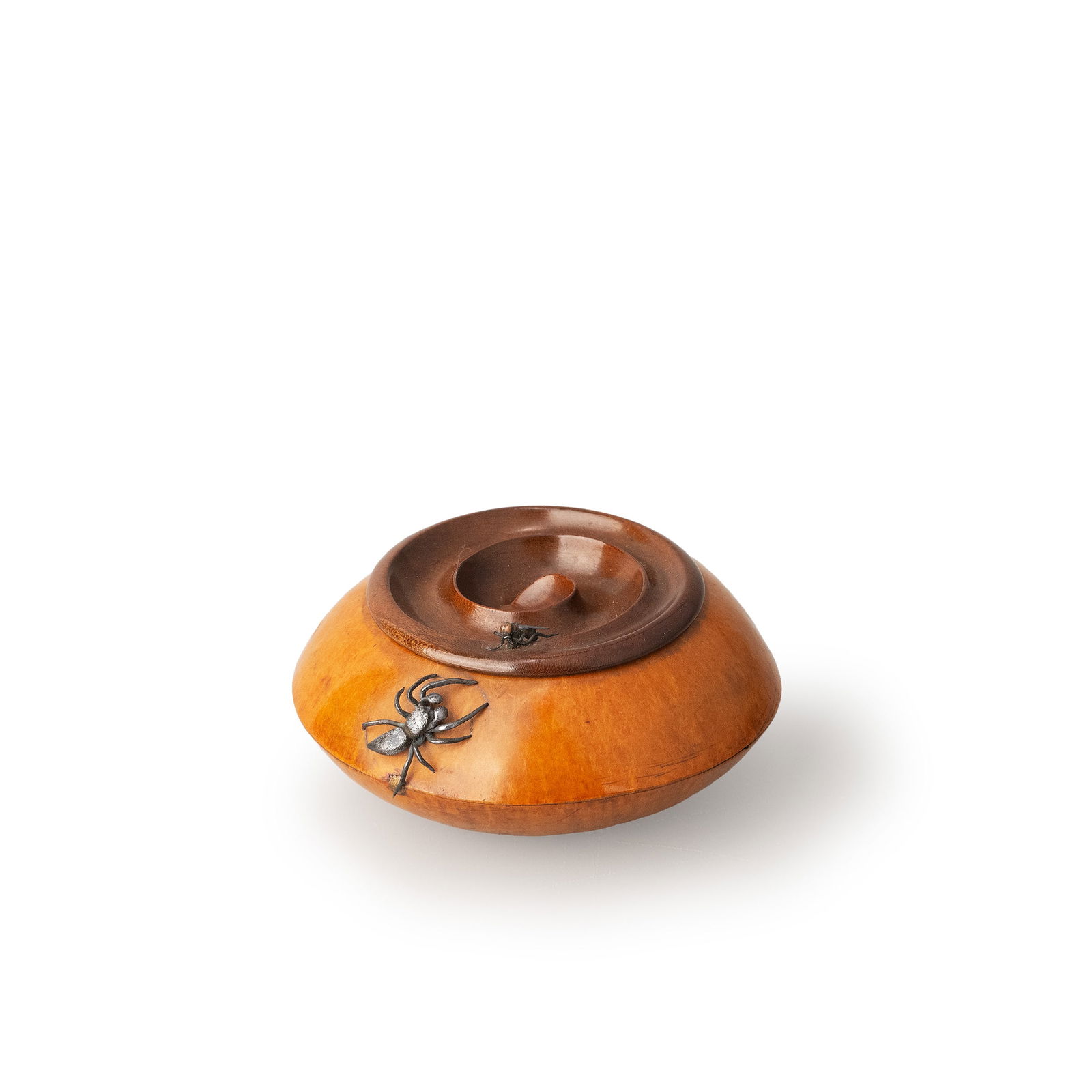 Kogo from the Collection of Anzai Shun: A charming incense container fashioned from a natural gourd, retaining its organic curvature and warm amber patina developed over time. The flattened form is fitted with a spiral element at the top, e