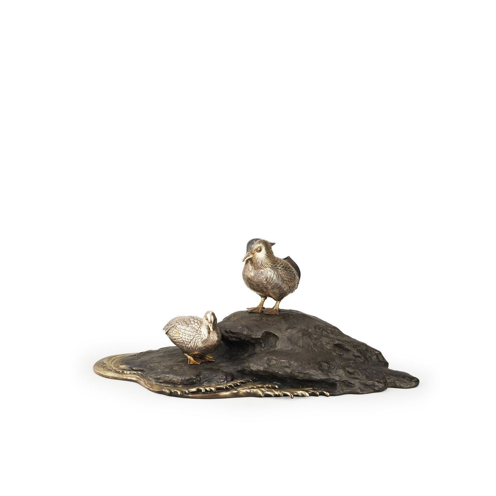 Mandarin Duck Metalwork Okimono: The composition depicts a pair of mandarin ducks resting upon a rocky waterside base, rendered with remarkable naturalism. Each feather is intricately engraved, demonstrating the refined metalworking 