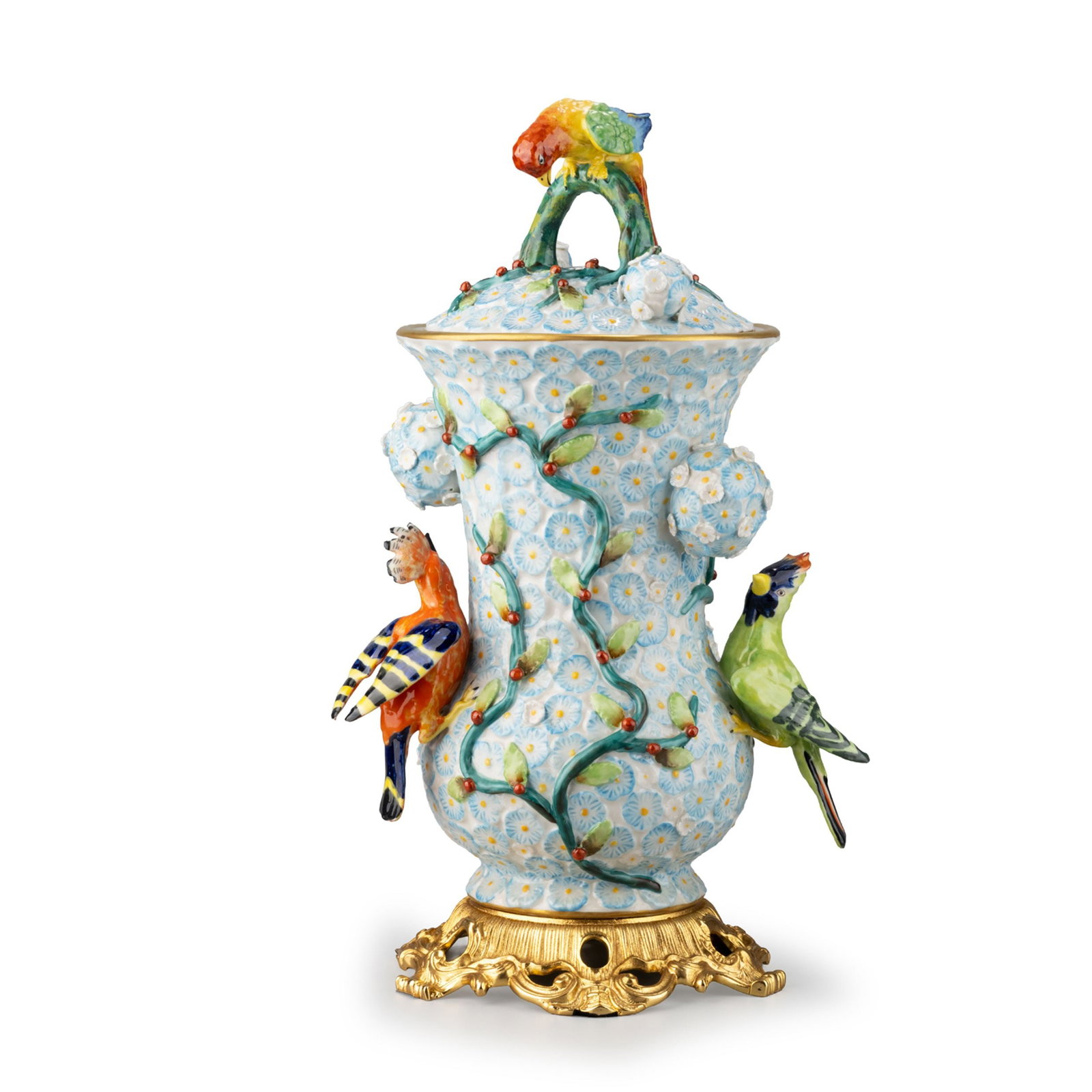 Covered Vase by Sevres: The surface is richly decorated with densely modeled high-relief blossoms intertwined with scrolling vines, buds, and berries, creating a vibrant three-dimensional composition.Colorfully modeled birds