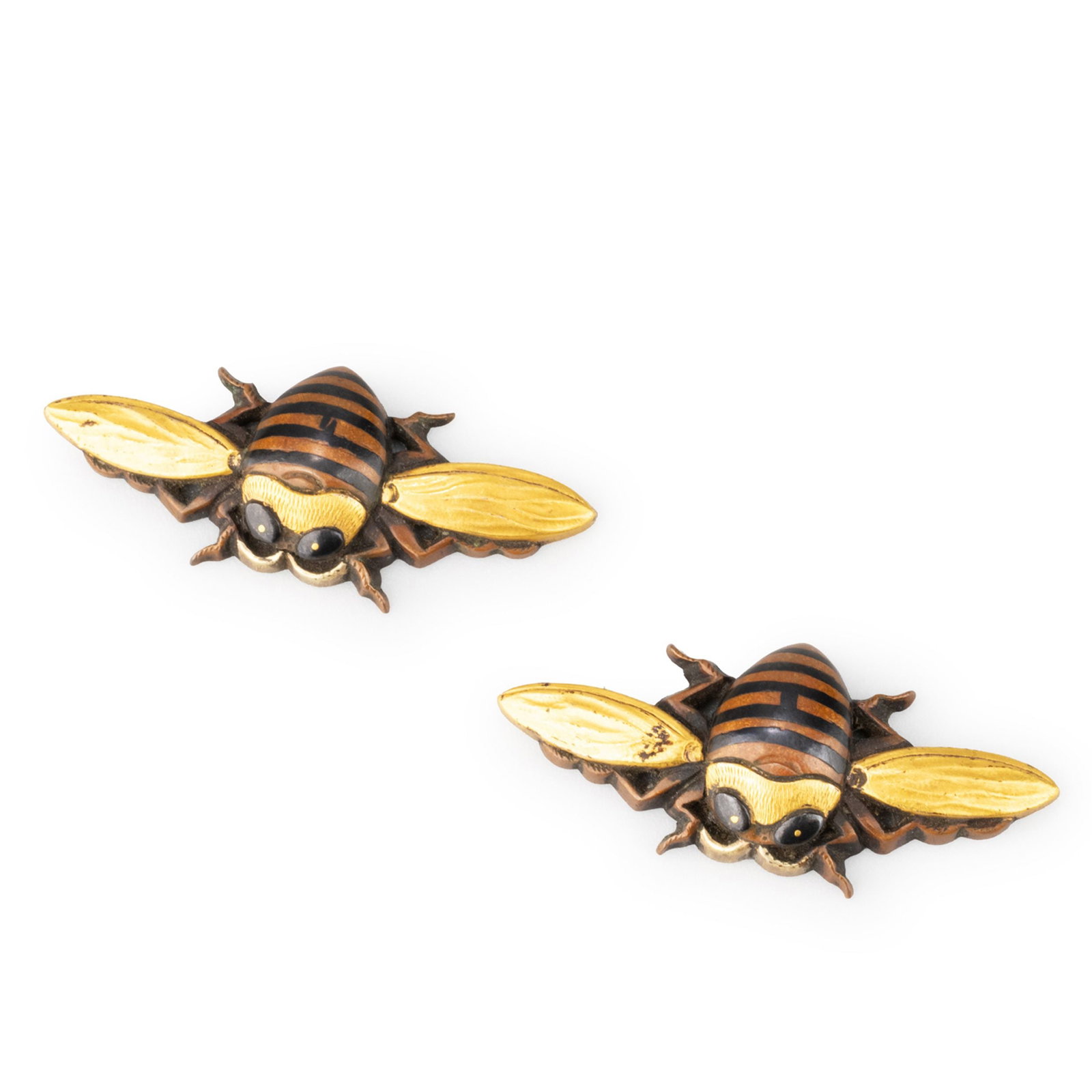 Pair of Gilt Bee Menuki by Goto Mitsuyasu: Executed in shakudo with gilt decoration, representing bees rendered with remarkable realism and refinement.Each bee is carved in high relief, featuring finely detailed striped abdomens finished in bl