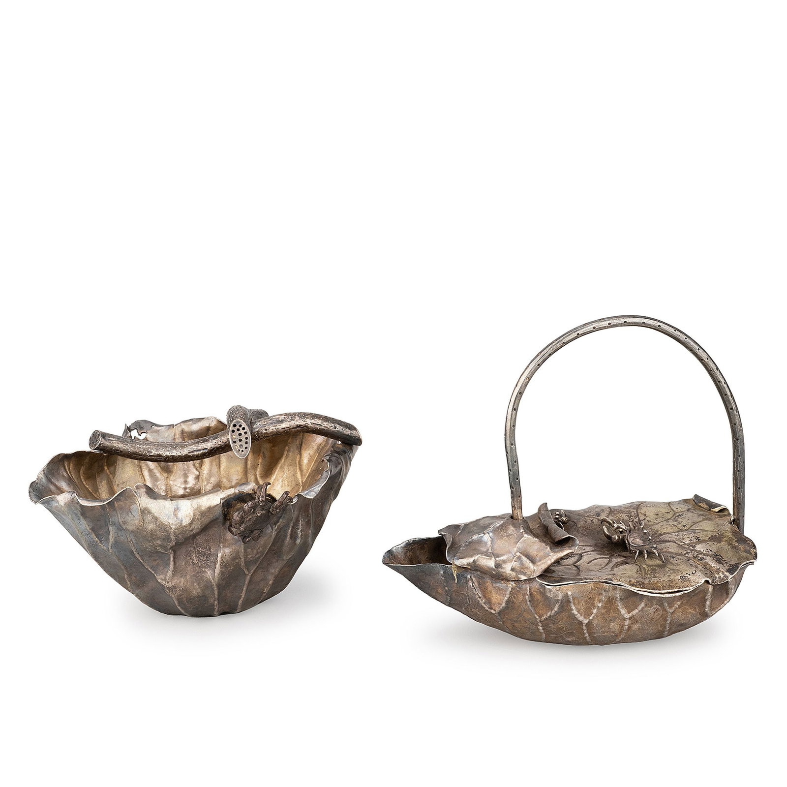 Silver Teapot and Yuzamashi Set: This elegant silver teapot and yuzamashi [water cooler] set is inspired by the beauty of a summer lotus pond. Both vessels are masterfully formed as natural lotus leaves, with softly undulating veins 
