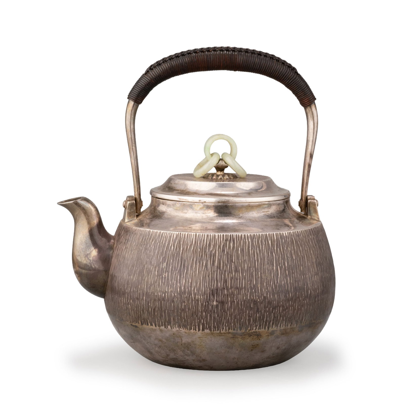 Pure Silver Hammered Kettle by Ikoma, Tomobako: This refined pure silver kettle by Ikoma displays an elegant rounded form enriched with a finely executed hammered surface [tsuchime], creating a lively texture that reflects light with subtle variati