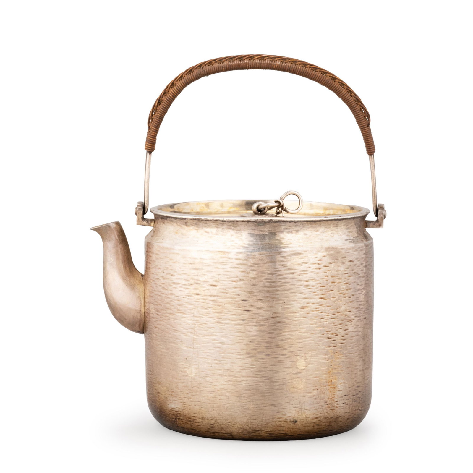 Kettle by Nakagawa Joeki, Tomobako: Of cylindrical form with a finely hammered surface, it is fitted with a gracefully curved spout, a rattan-wrapped swing handle, and a flat cover with a simple ring finial. The restrained design reflec