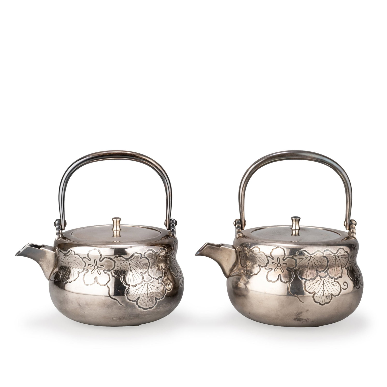 Pair of Sake Warmers by Nakagawa Joeki: This elegant pair of Nant- [pure silver] sake warmers was crafted by Nakagawa Joeki after the design favored by S-k-sai and is preserved with its original tomobako. The rounded bodies, graceful swing 