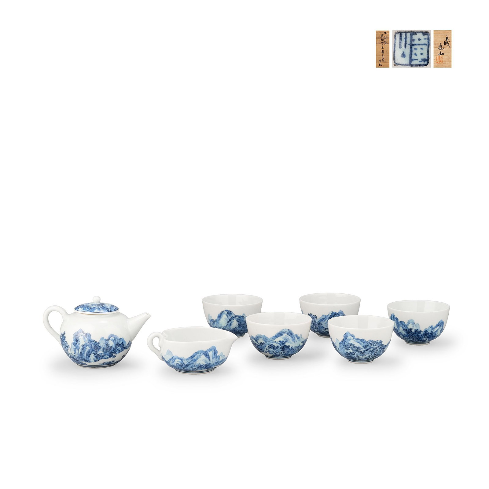 Sencha Tea Set by Ishino Ryuzan, Tomobako: This elegant sencha tea set by Ishino Ryuzan comprises a teapot, yuzamashi [water cooler], and five tea cups, presented in its original tomobako. Executed in fine Kutani porcelain, each piece is decor