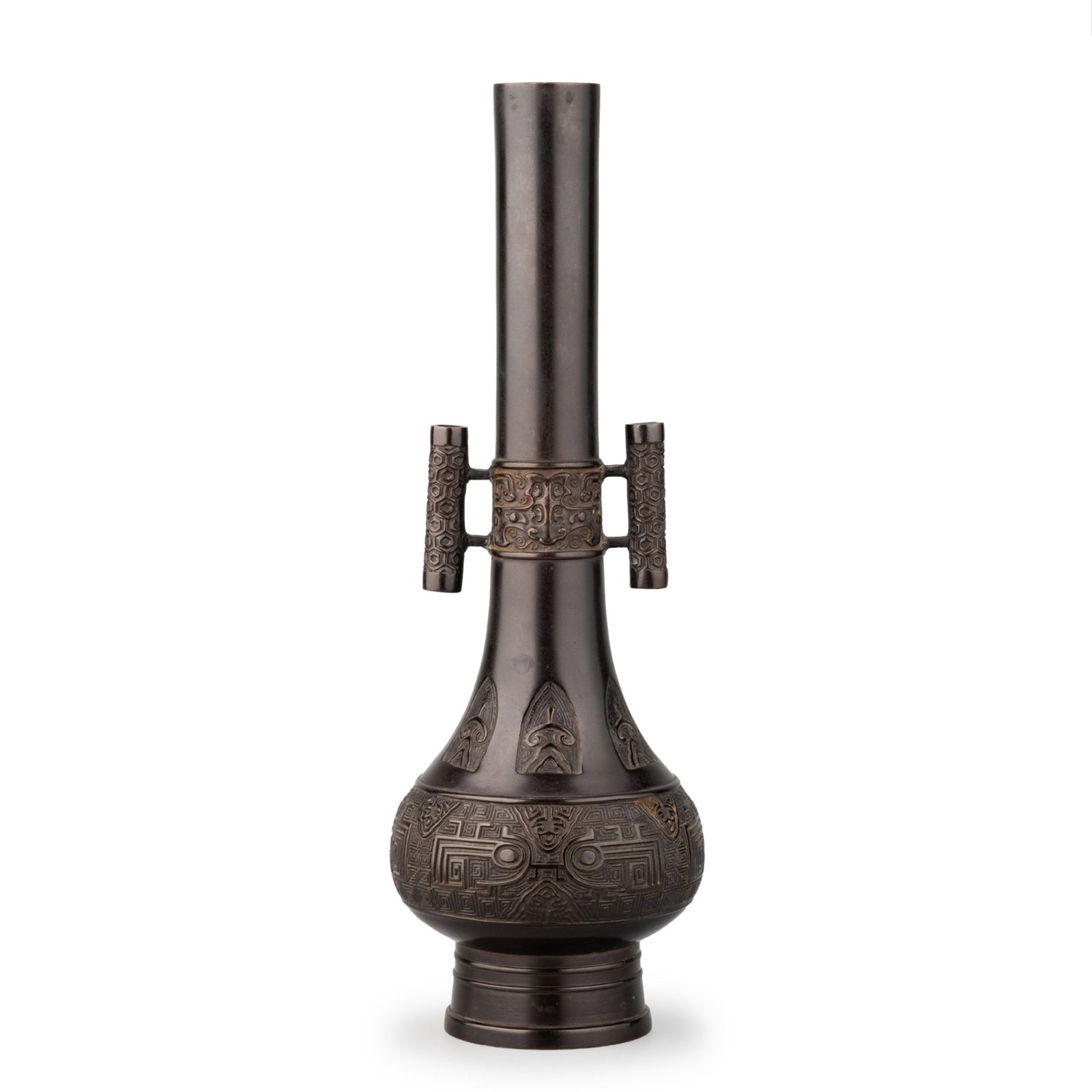 Bronze Flower Vase: This archaistic bronze vase is modeled after ancient Chinese ritual bronzes, featuring a slender cylindrical neck flanked by tubular side handles. The compressed globular body is richly decorated with