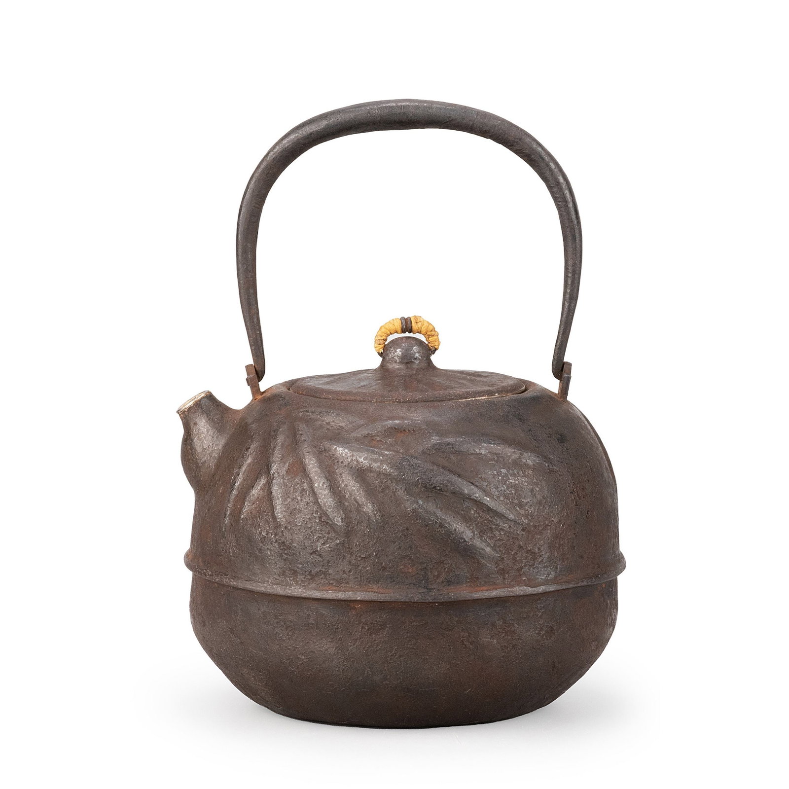 Hammered Iron Kettle, Hata Zoroku Hakogaki: This antique iron kettle displays the quiet beauty of aged iron, its rounded form decorated with a repousse bamboo design executed in the traditional uchidashi technique.The bamboo leaves are formed b