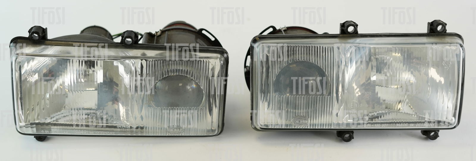 Ferrari 355 Hella Headlamps: A pair of used Ferrari 355 headlamps by Hella, good general order.