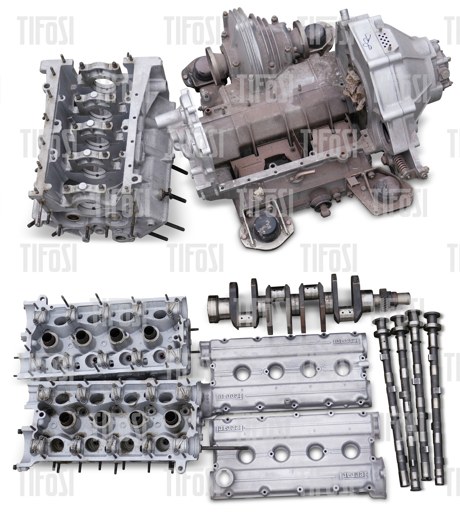 Ferrari 308 F106B Engine & Gearbox: A dismantled Ferrari F106B engine, consisting of a block stamped *00478*, a pair of cylinder heads, four camshafts, a crankshaft, camcovers, front case, along with its matching gearbox and