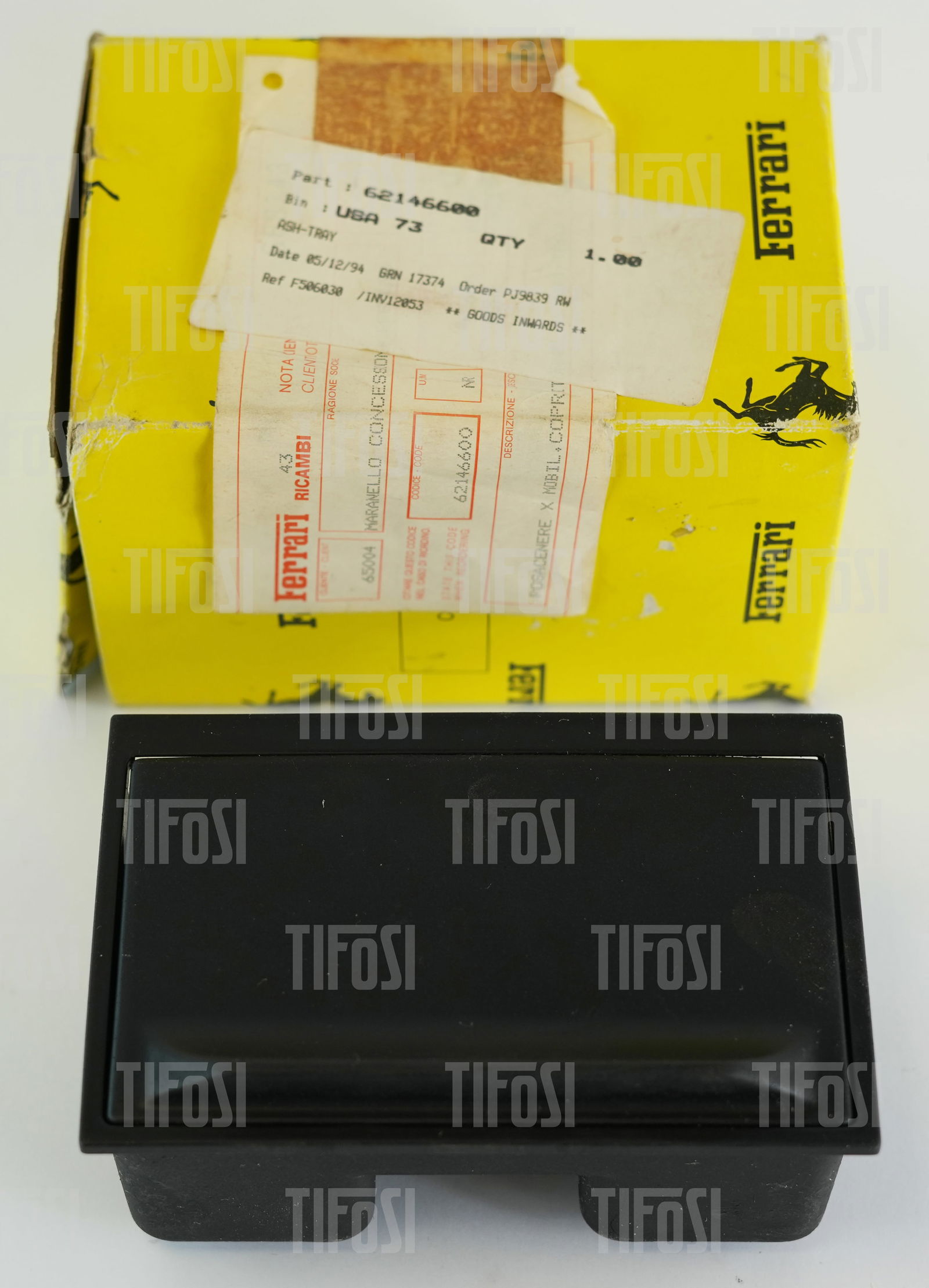 Ferrari 348 Ashtray NOS: A new old stock Ferrari 348 ashtray. The coating has gone sticky. Very difficult to find. Ferrari P/N 62146600.