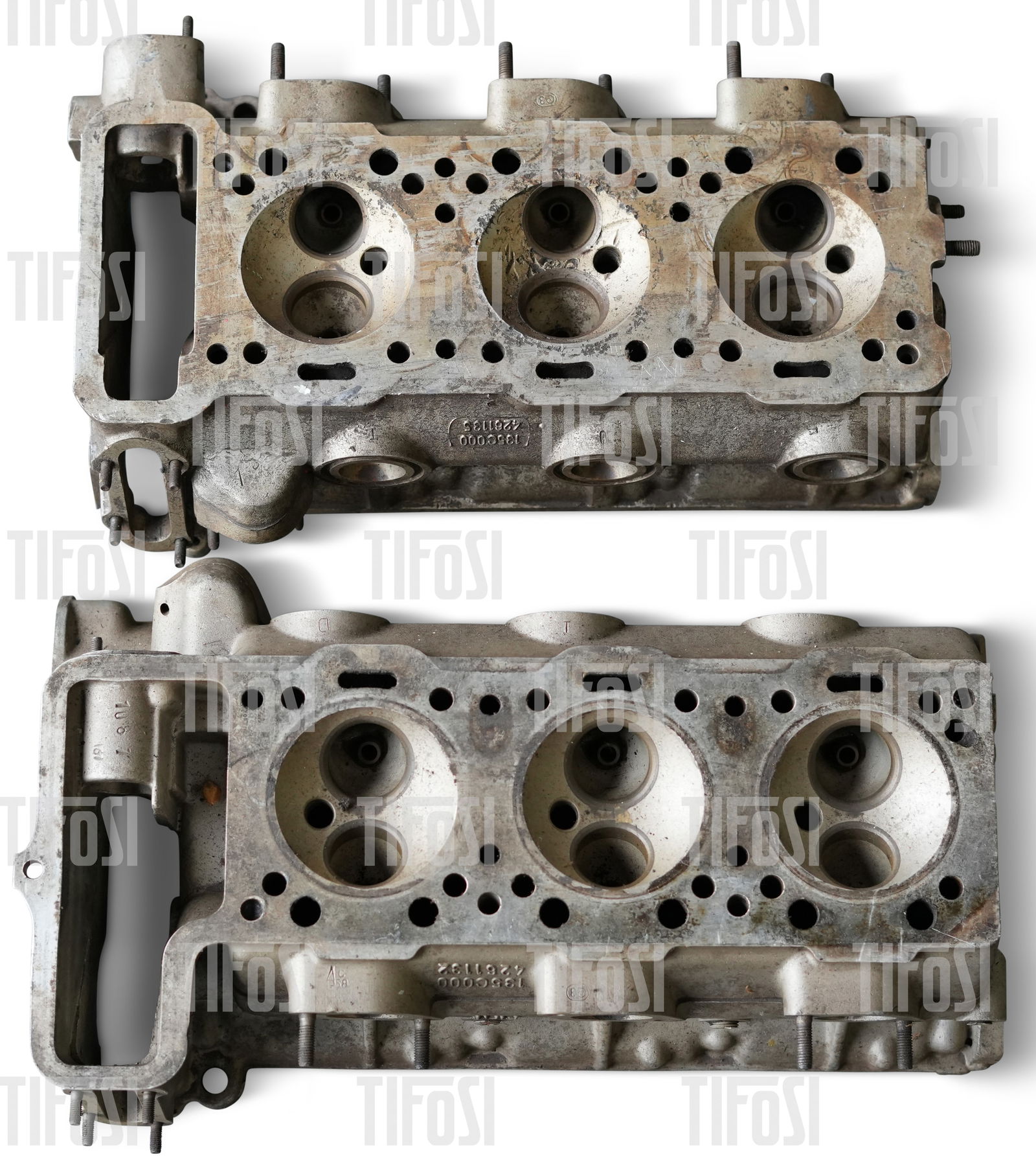 Ferrari Dino 246 Cylinder Heads: A matched pair of bare Ferrari Dino 246 cylinder heads, one chamber will require some repair.