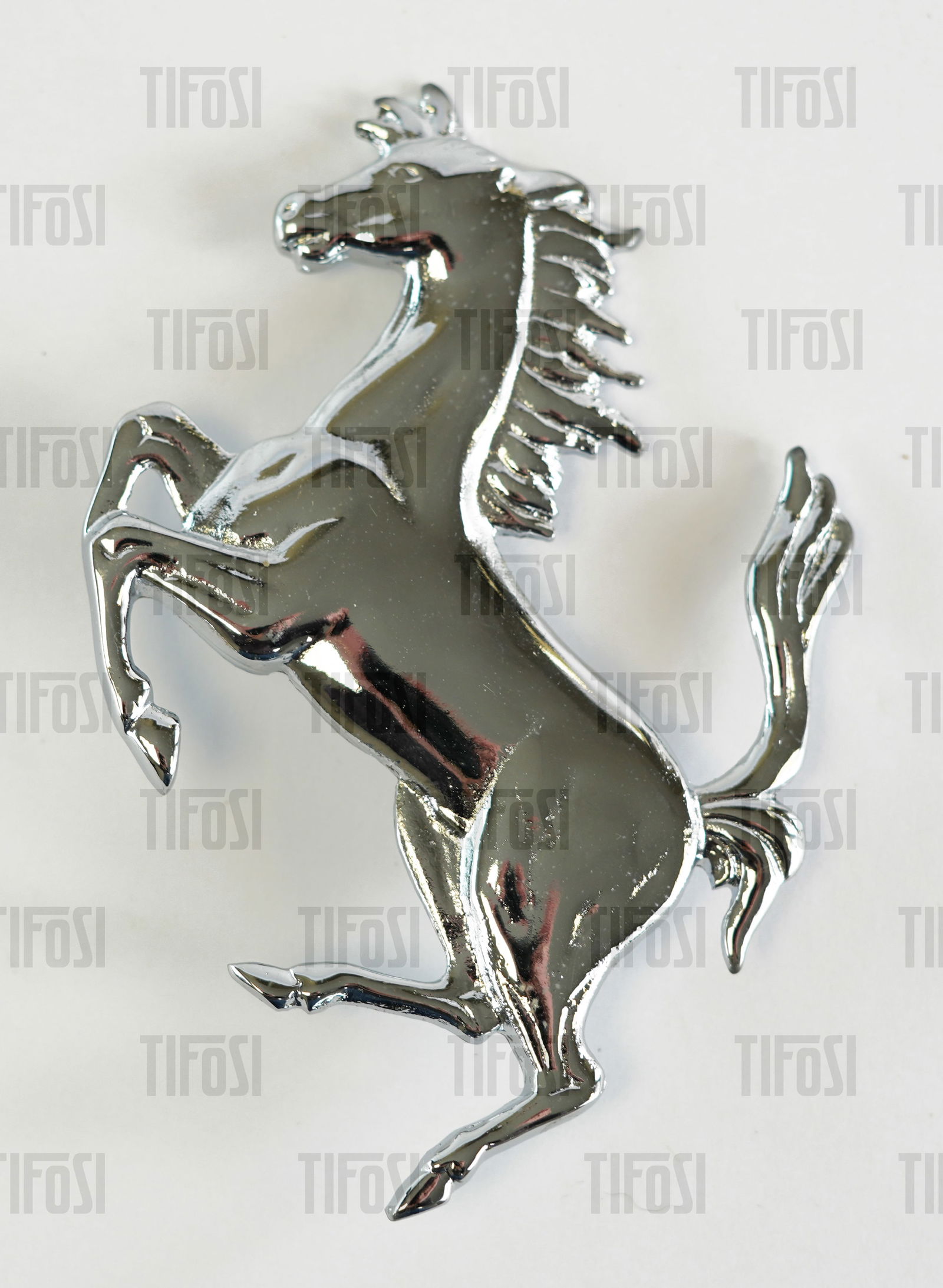 Ferrari Prancing Horse Chrome Badge NOS: A genuine chrome plated metal Ferrari Cavallino badge to suit 2000s models, NOS, 10.5CM height.