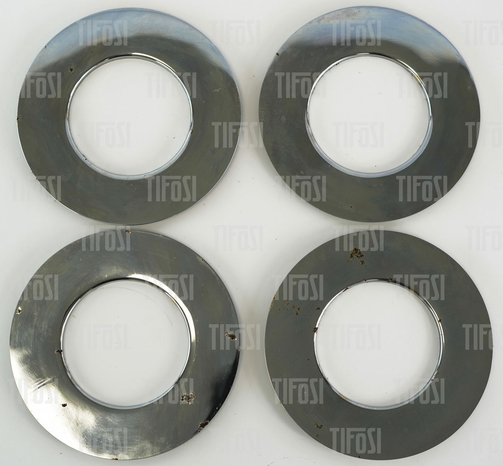 Ferrari 365 GTB/4 Daytona Wheel Trims: A set of four used Ferrari 365 GTB/4 Daytona wheel trims.