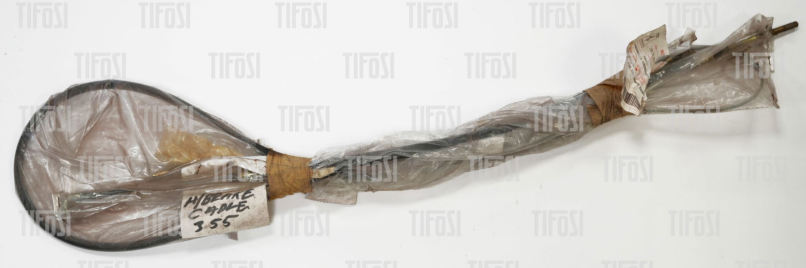 Ferrari F355 Handbrake Cable NOS: A new old stock genuine Ferrari F355 handbrake cable.