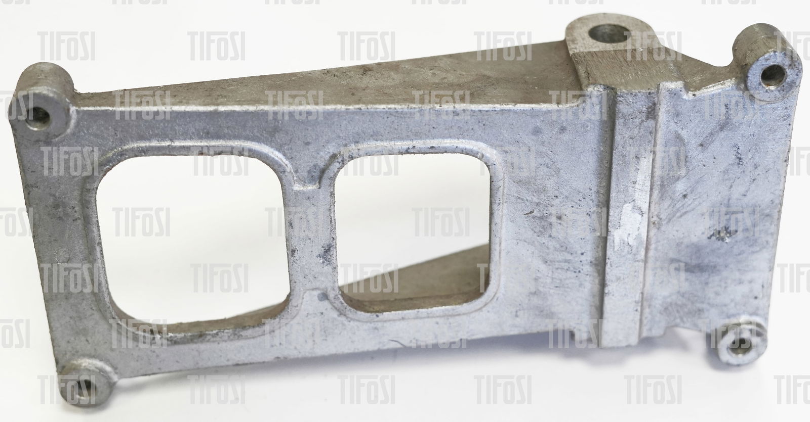 Ferrari 308 Engine Stabiliser Bracket NOS: A new old stock Ferrari 308 engine stabiliser bracket.