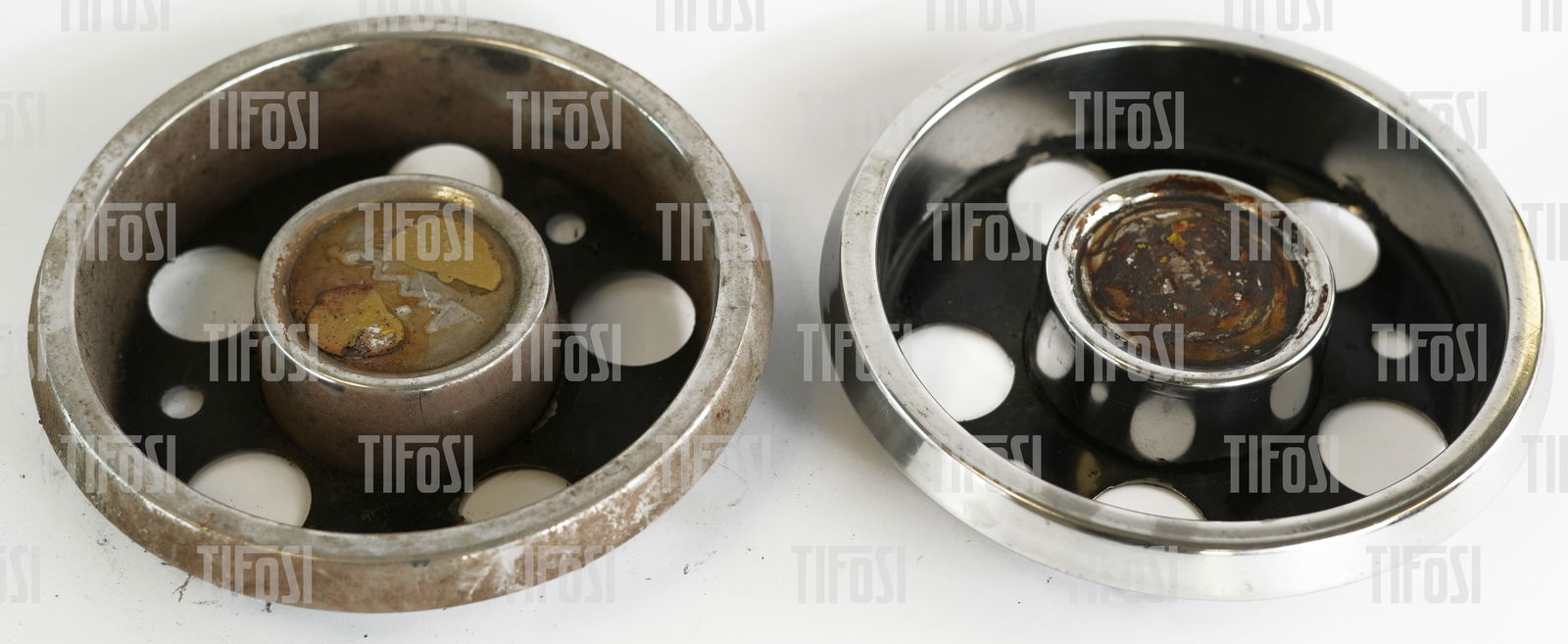 Ferrari 246 Dino Hubcaps: A pair of original Ferrari 246 Dino hubcaps, used but straight.