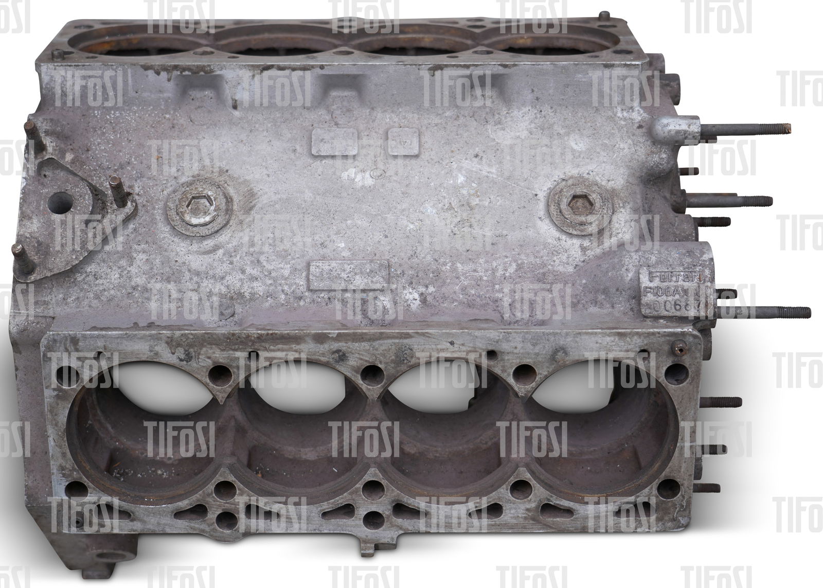 Ferrari 308 F106A Engine Block: An original Ferrari 308 tipo F106A bare engine block. Good condition, stamped *00687*.