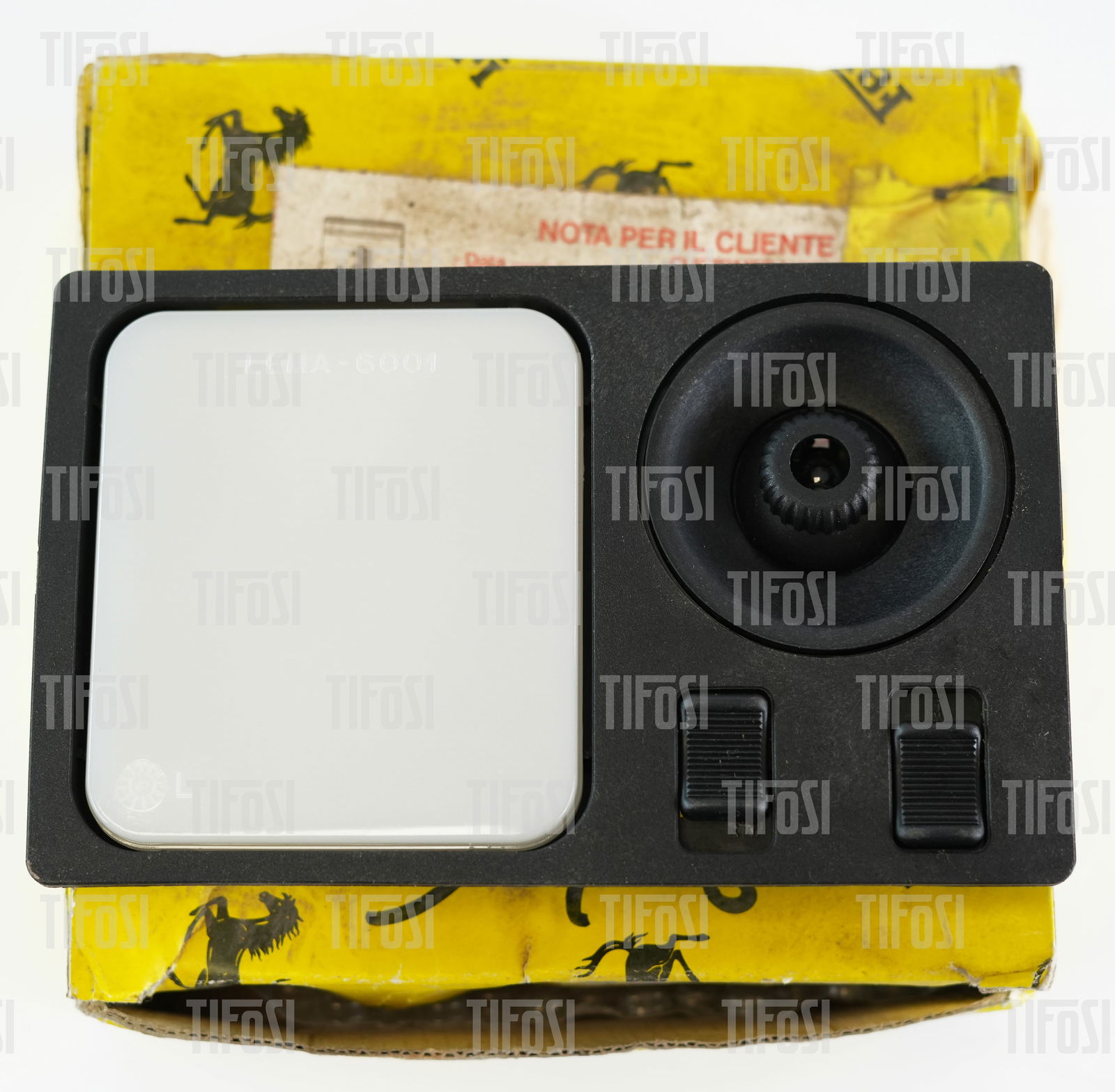 Ferrari 348 Interior Lamp NOS: A new old stock Ferrari 348 Interior light, still in Ferrari packaging. P/N 134458.