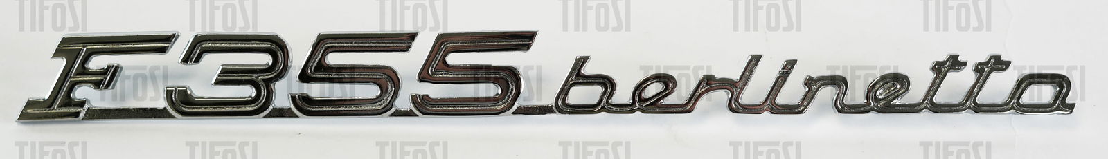 Ferrari F355 Berlinetta Script Badge NOS: A new old stock Ferrari F355 Berlinetta metal script rear badge. 26.5 CM.