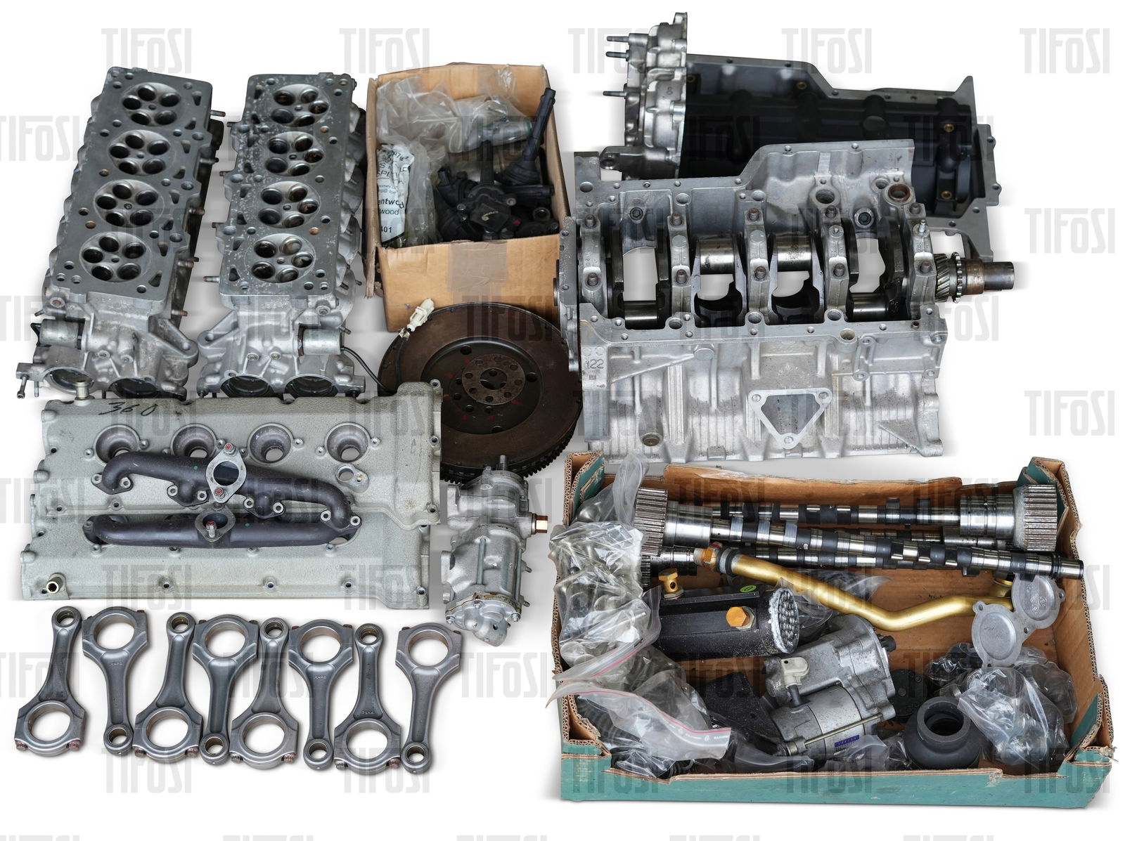 Ferrari 360 Engine: A disassembled Ferrari 360 engine, appears to be complete except for pistons. Engine is clean and presents well.