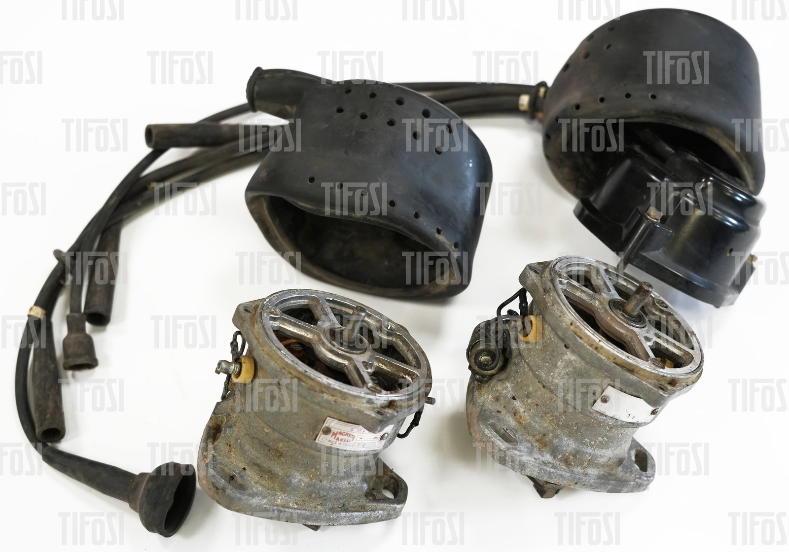 Ferrari 308 Marelli S159A Twin Distributors: A pair of original Magneti Marelli S159A distributors to suit early Ferrari 308 engines. Both distributors spin freely and appear to be in good condition. They are missing rotor arms and one cap. The