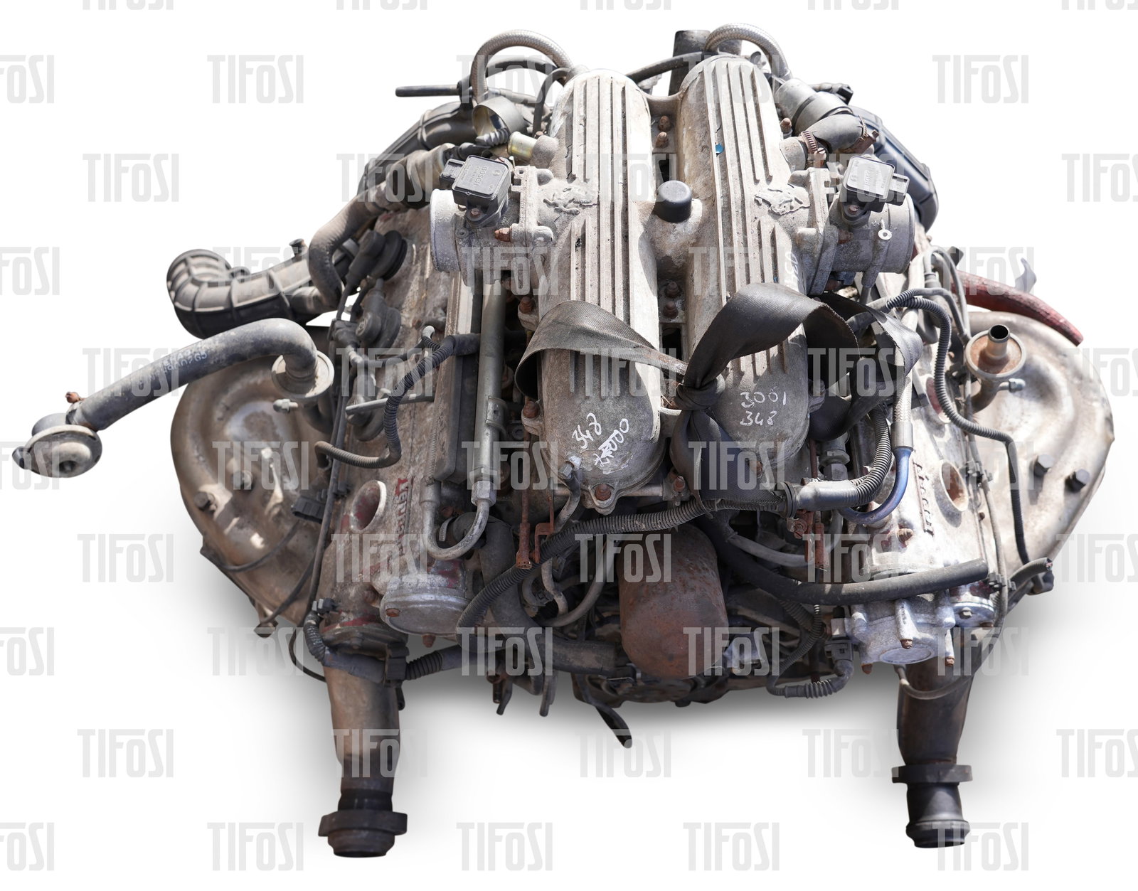 Ferrari 348 Mondial Tipo 119 Engine: A genuine Ferrari tipo F119 engine removed from a crashed Ferrari 348 several years ago. Appears to be largely complete and in good external condition. Internal condition unknown but was running when