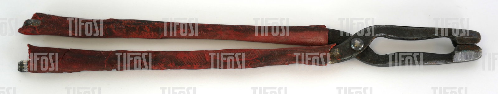 1950s Ferrari Spark Plug Tongs Tool: A pair of original Ferrari spark plug tongs, as supplied in the tool kits of various models from the late 1940s through to 1955 including 166, 195 212. Original red rubber insulation is disinteg