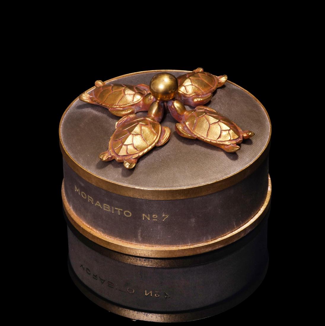 1951 Marc Lalique - Morabito No. 7 powder box: 1951 Marc Lalique for Morabito No. 7 powder box, gilt bronze turtles on silk covered box, outer box. 3 x 4 1/2 in.