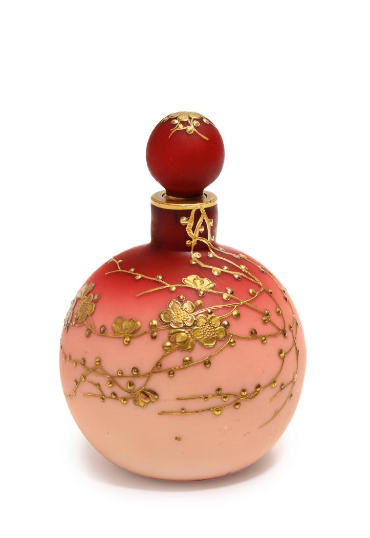 1880s Thomas Webb peachblow glass perfume bottle: 1880s Thomas Webb peachblow glass perfume bottle and stopper, milk-white lining, surface finish shading from velvet red to pale pink, enameled gold cherry blossoms, butterfly on reverse. 5 3/4 in.